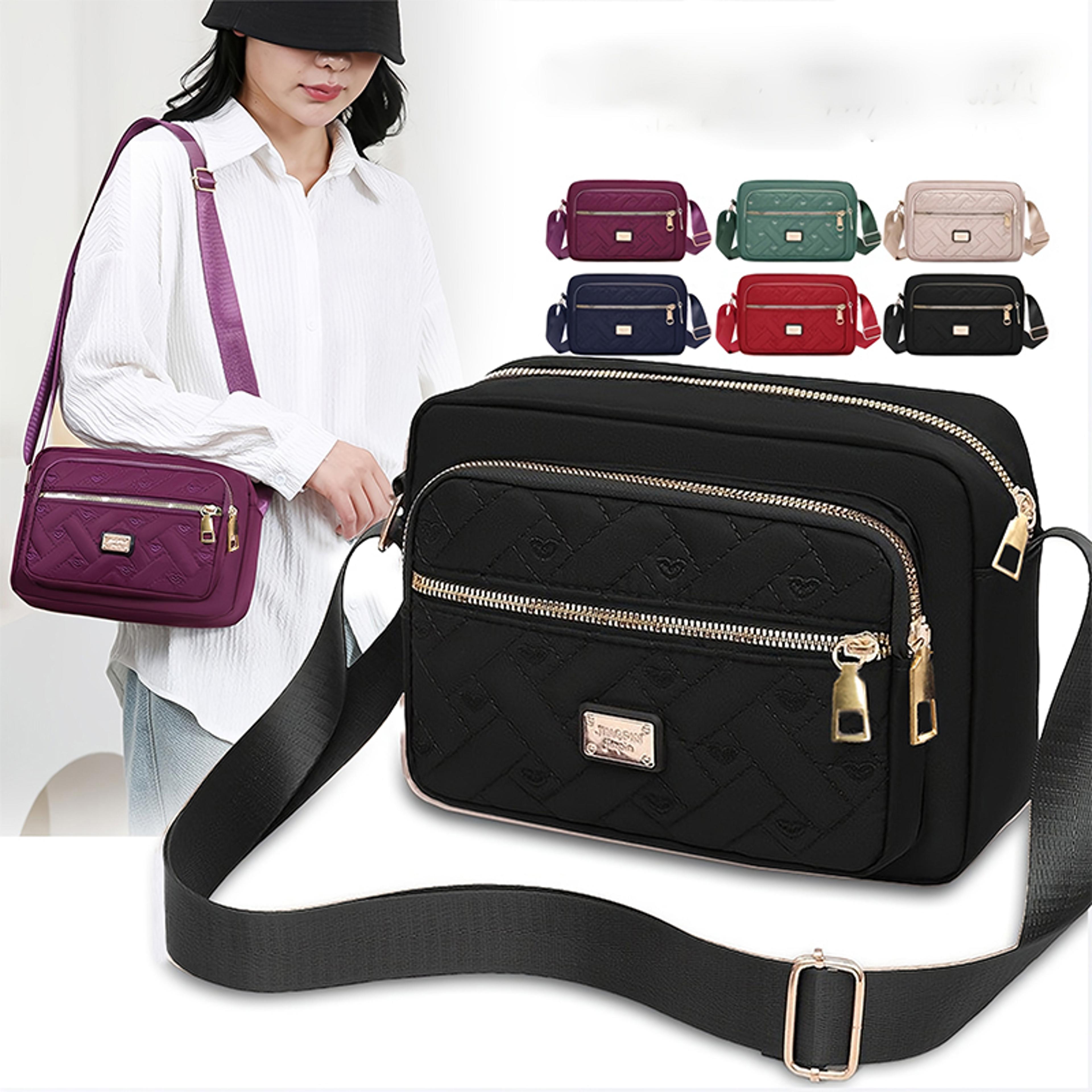 womens quilted nylon crossbody bag with multi zipper pockets and adjustable strap