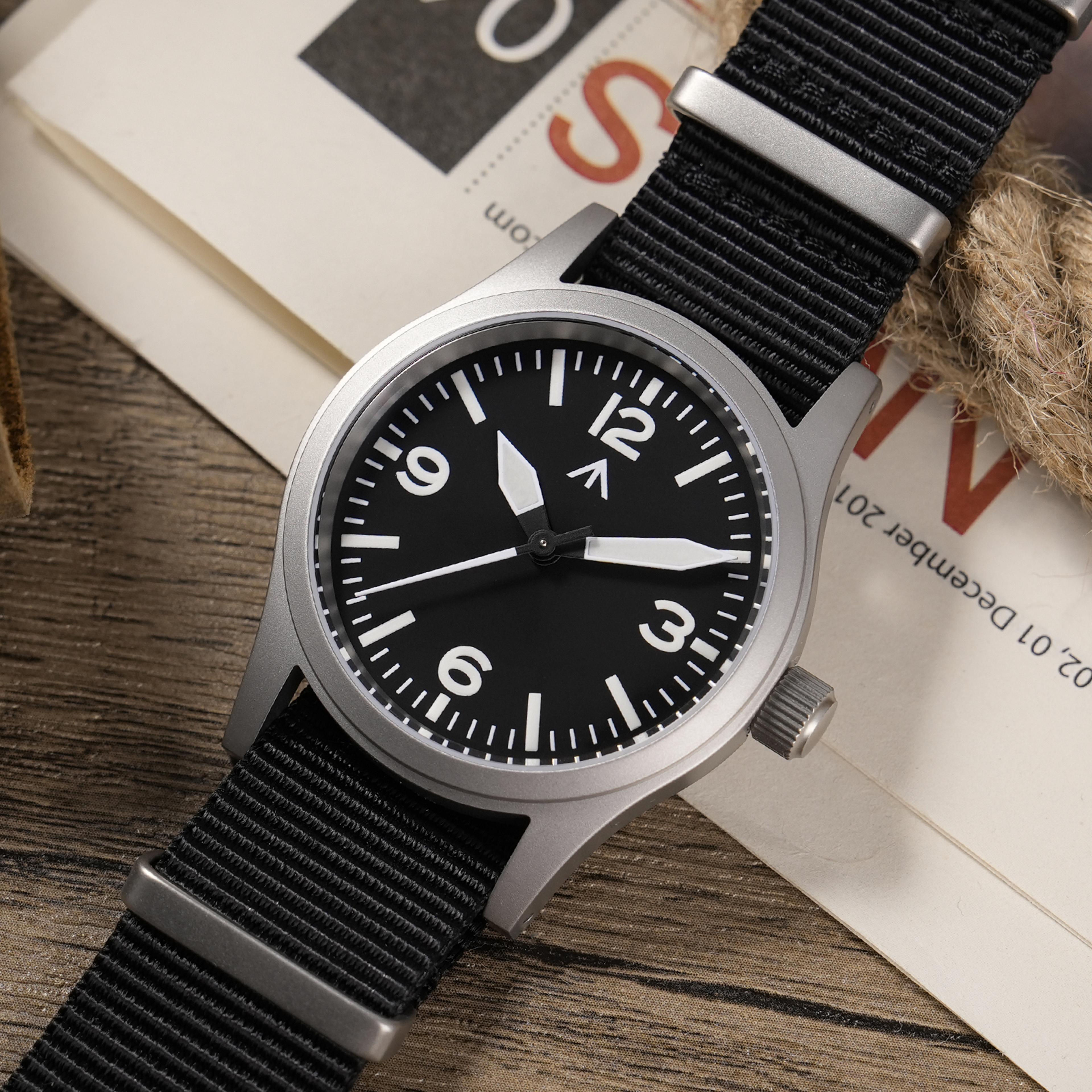 vintage field watch with sweep movement and sapphire crystal