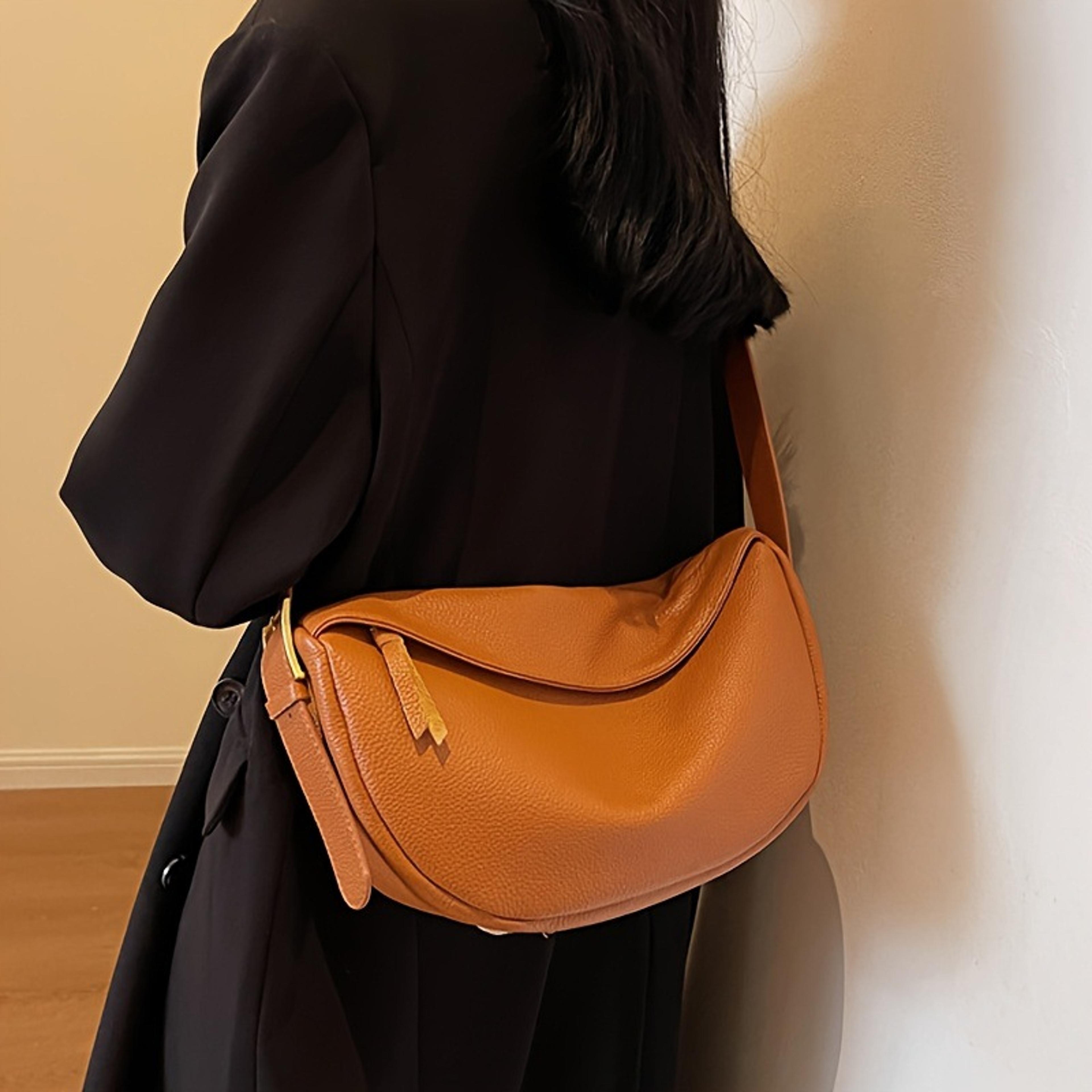 retro pu leather dumpling bag with zipper closure and interior pocket
