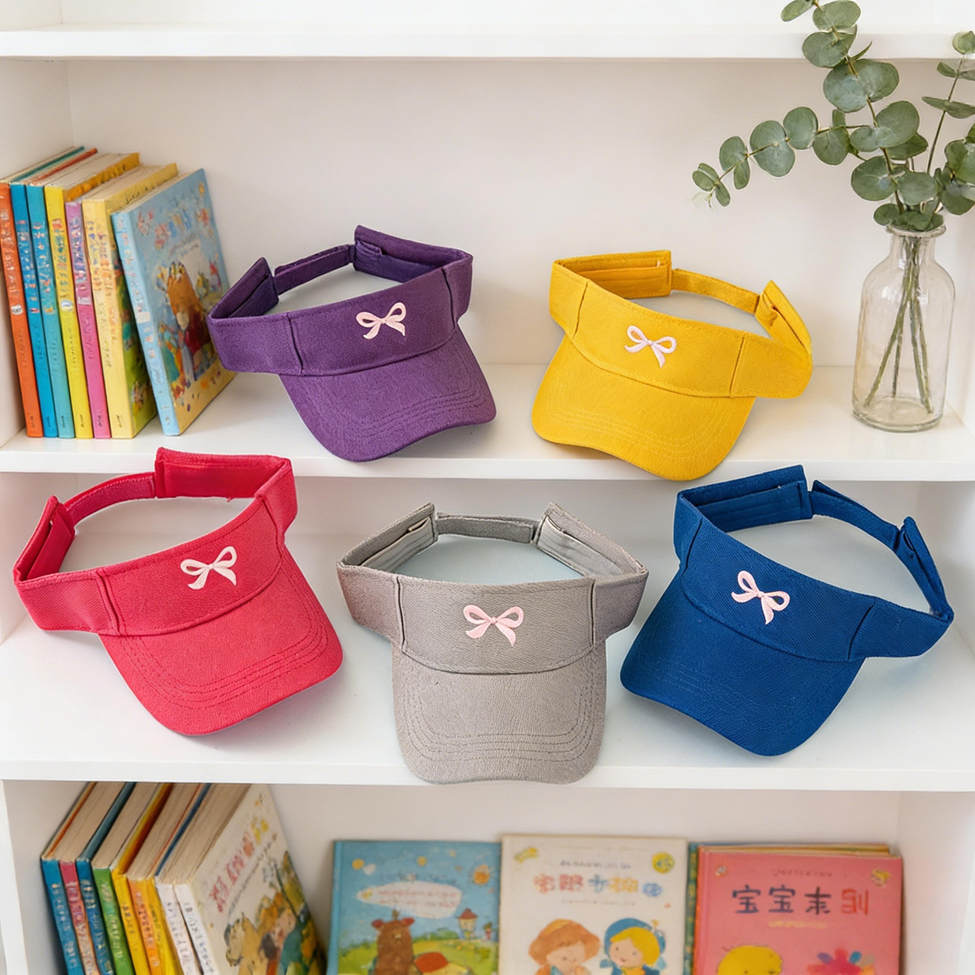 unisex casual polyester baseball cap with blue sun visor and pink bow accent