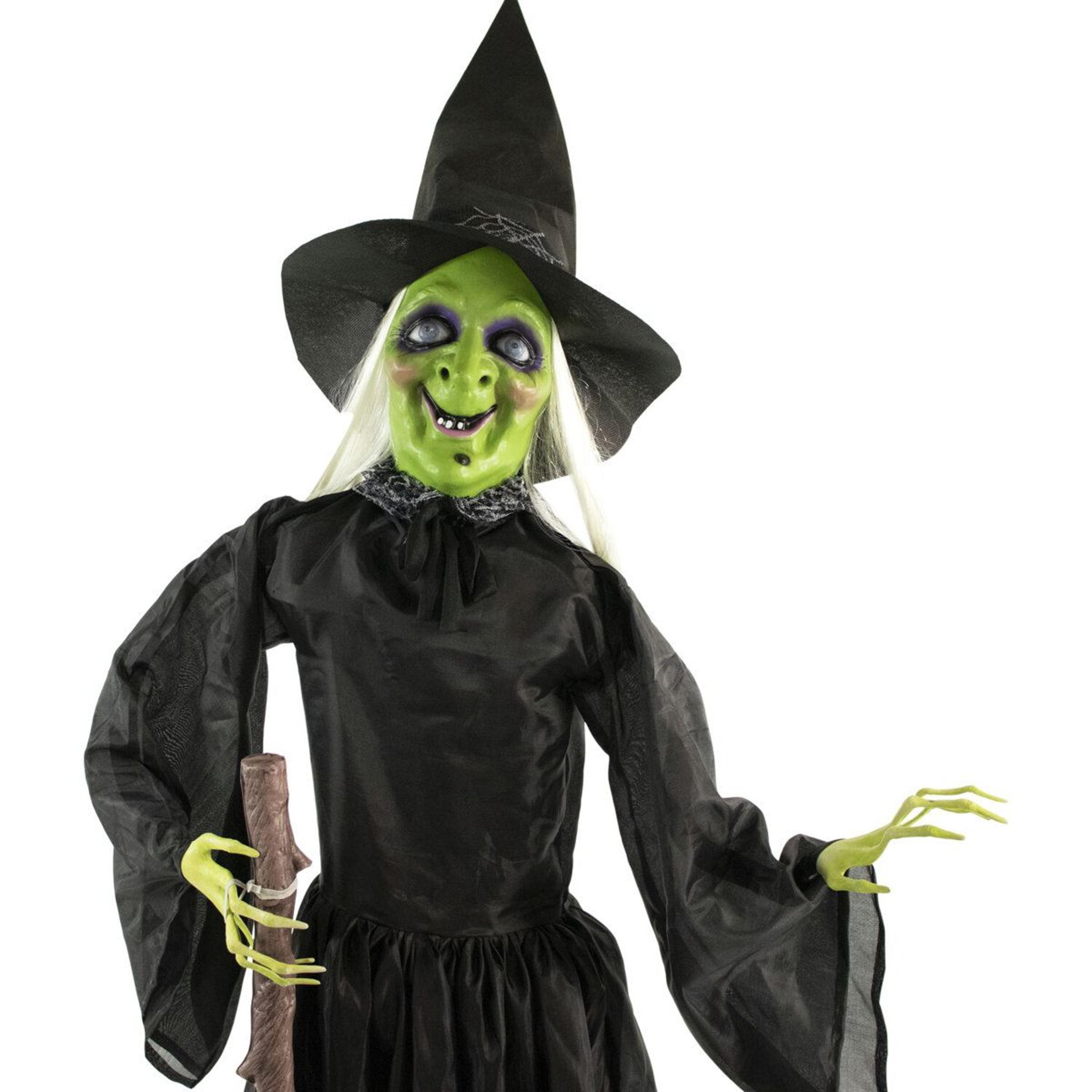 animated halloween witch with flashing red eyes and broomstick