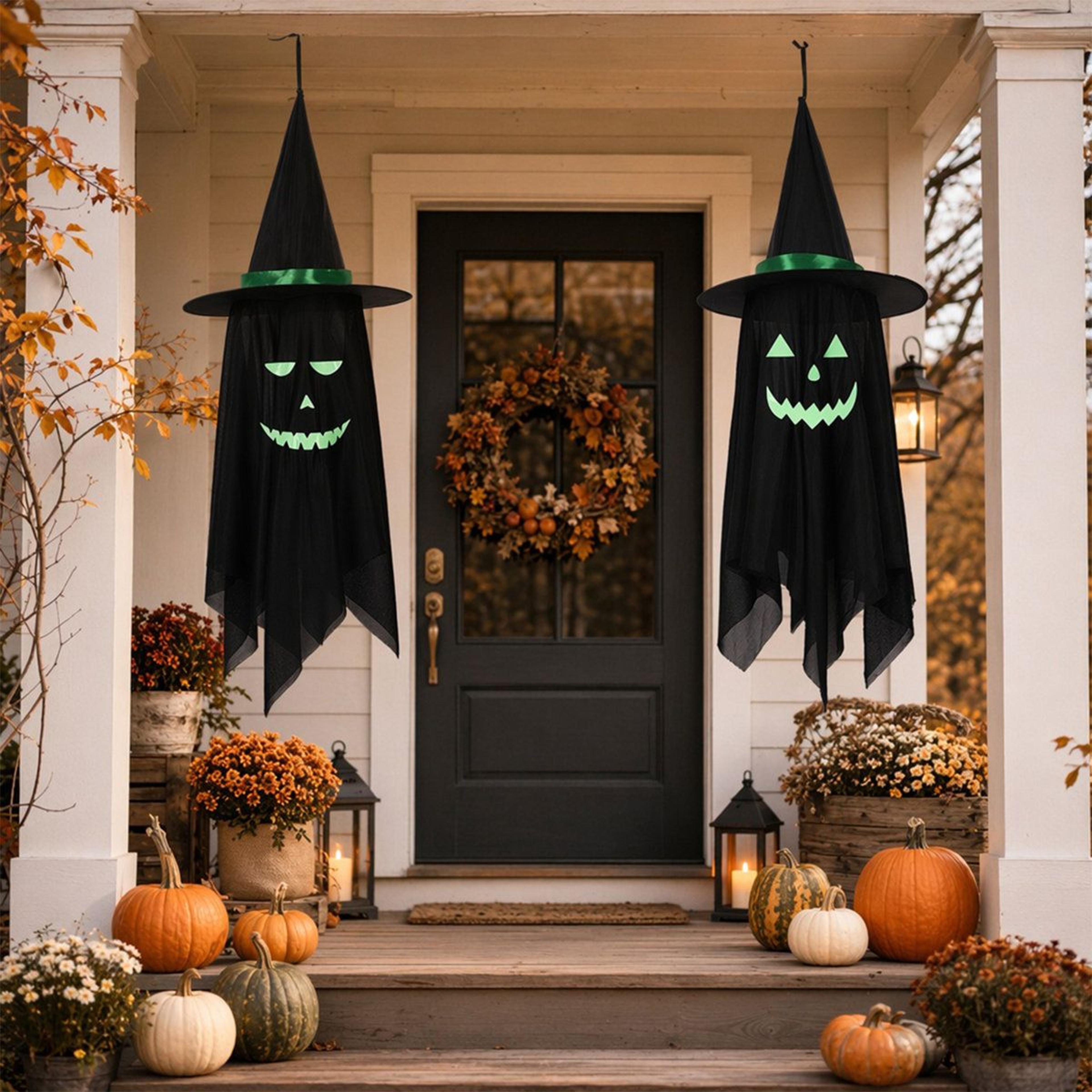 halloween hanging ghost decorations with glowing faces for outdoor display