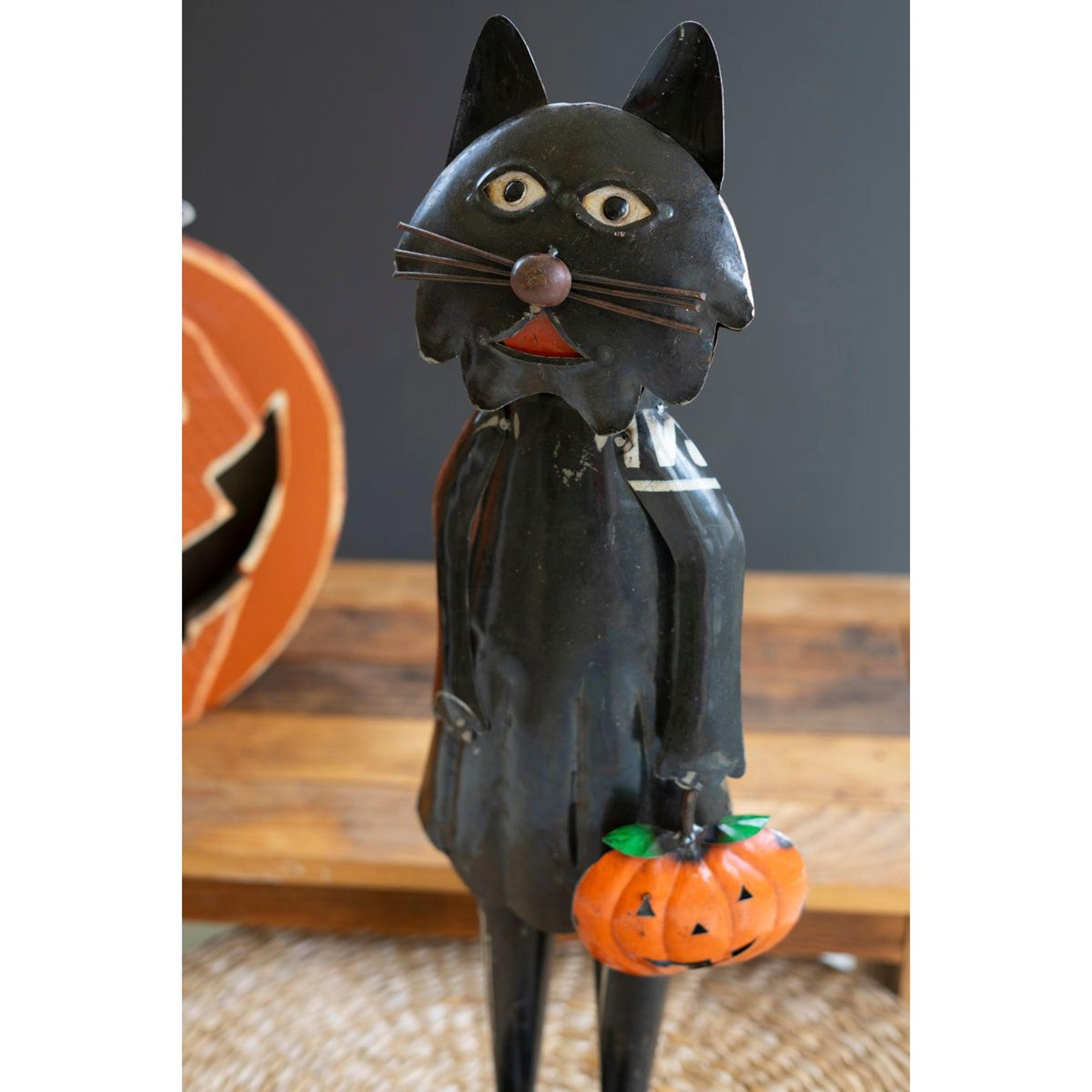 standing black halloween cat holding pumpkin metal decoration