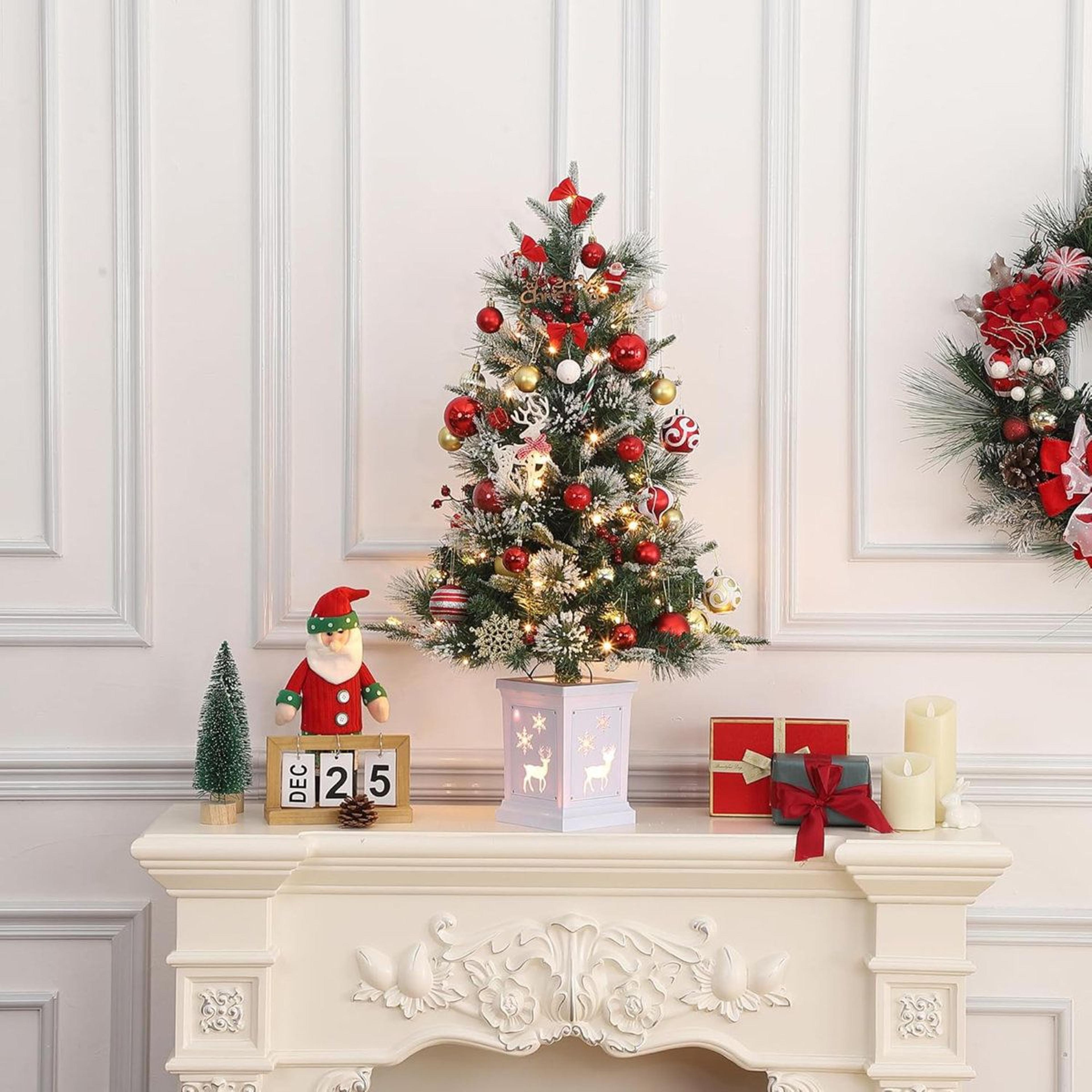 pre lit artificial christmas tree with led lights and illuminated base