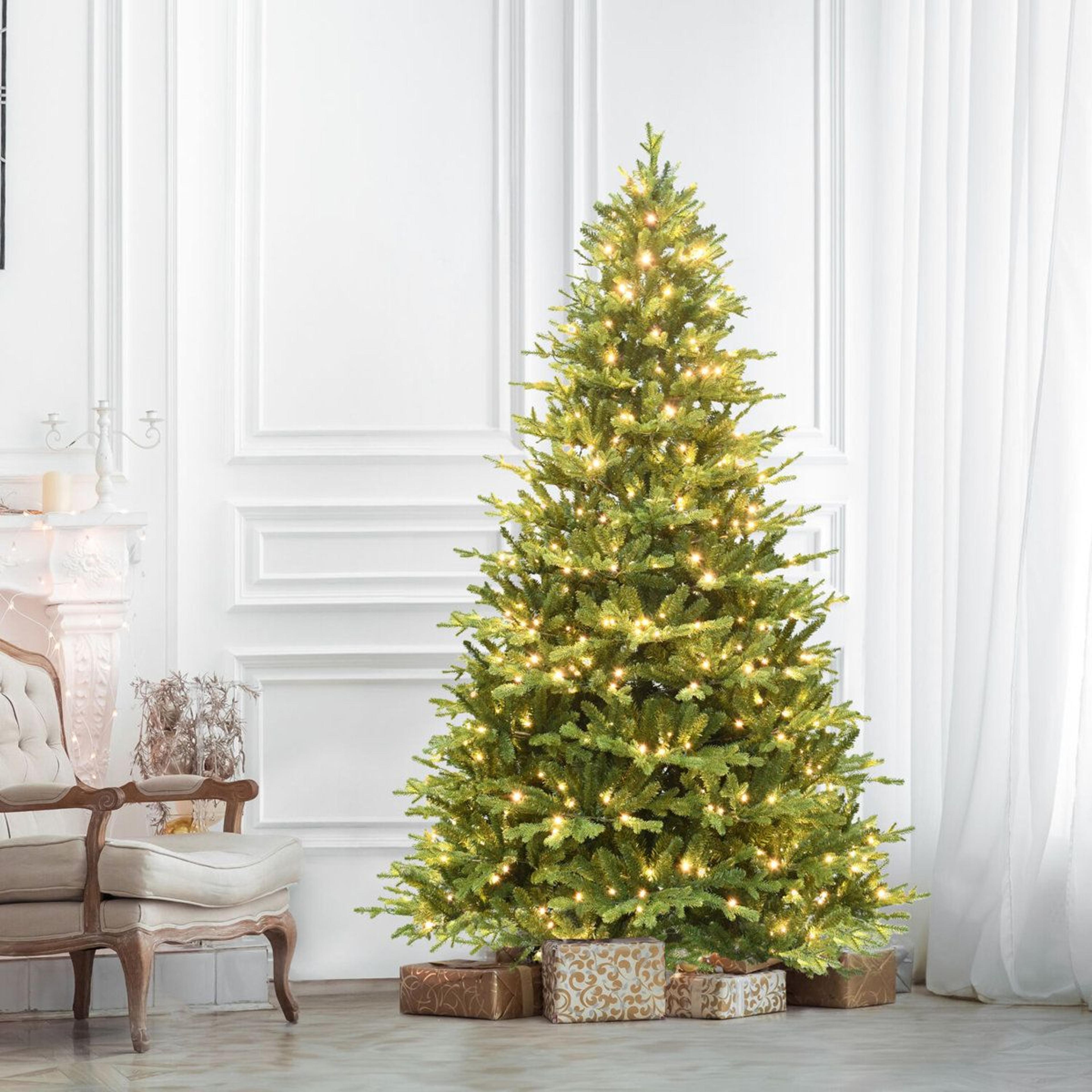 pre lit artificial christmas tree with warm white led lights and hinged branches