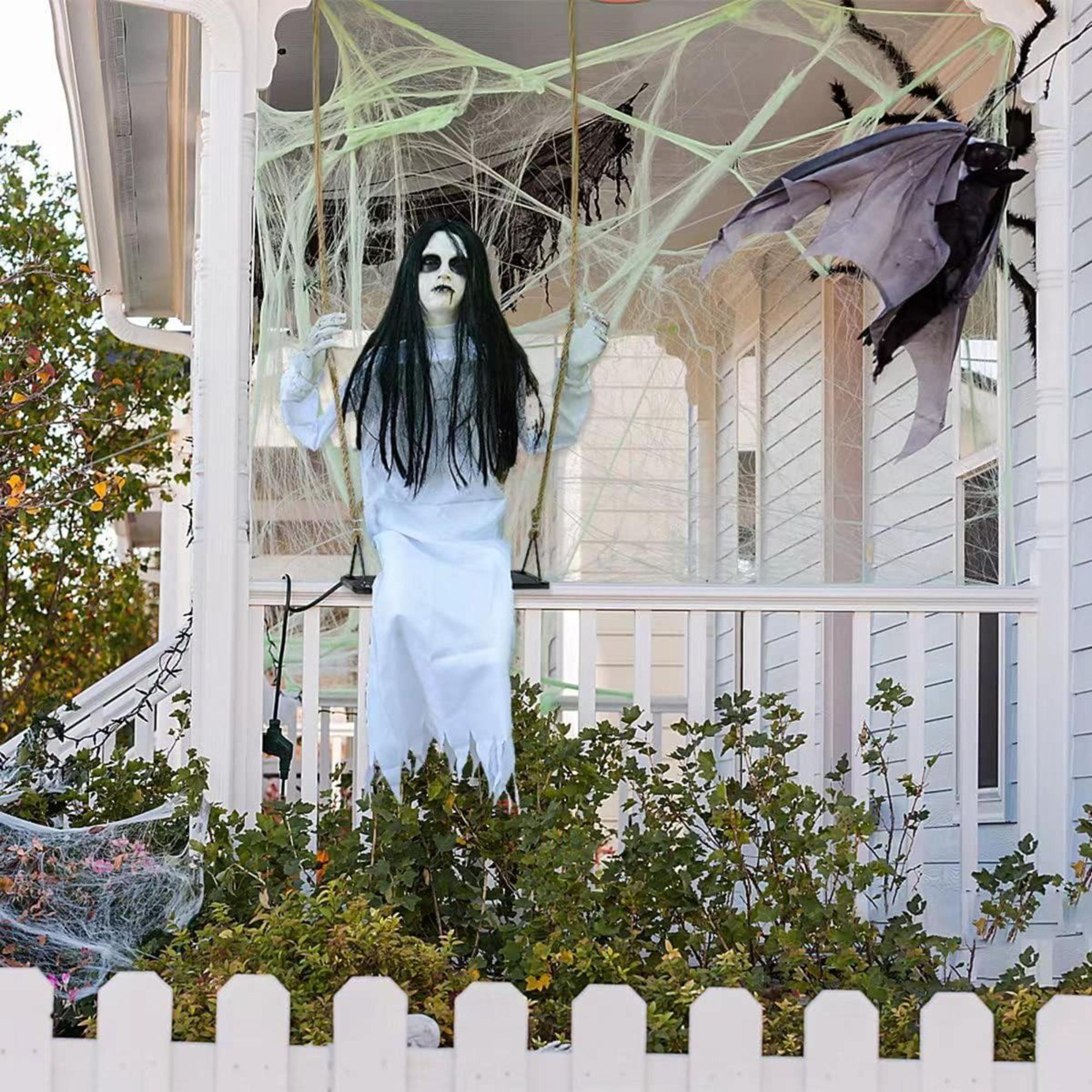 hanging swinging girl halloween decoration with creepy expression for outdoor decor