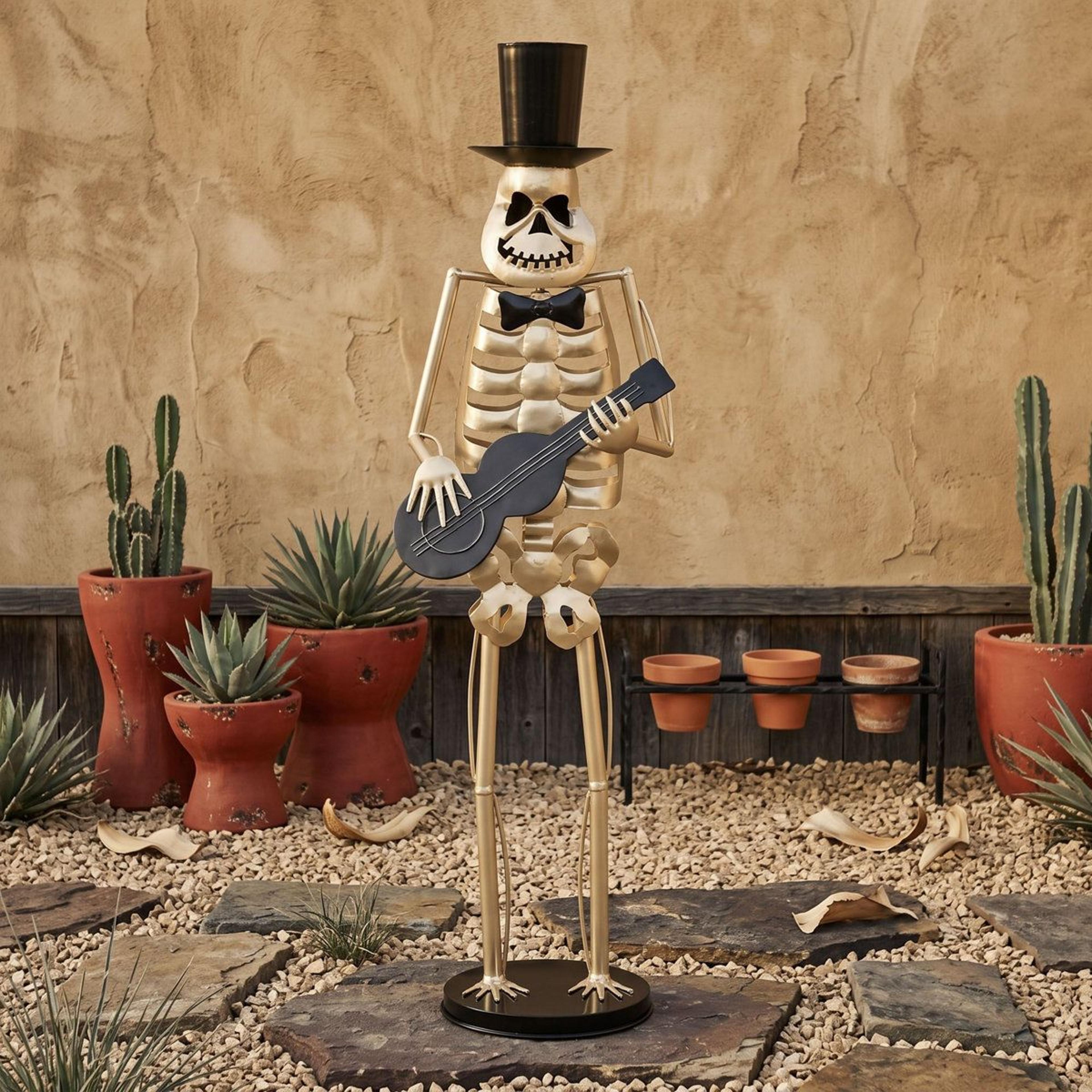 metal guitarist skeleton statue with top hat and bow tie gold halloween decor