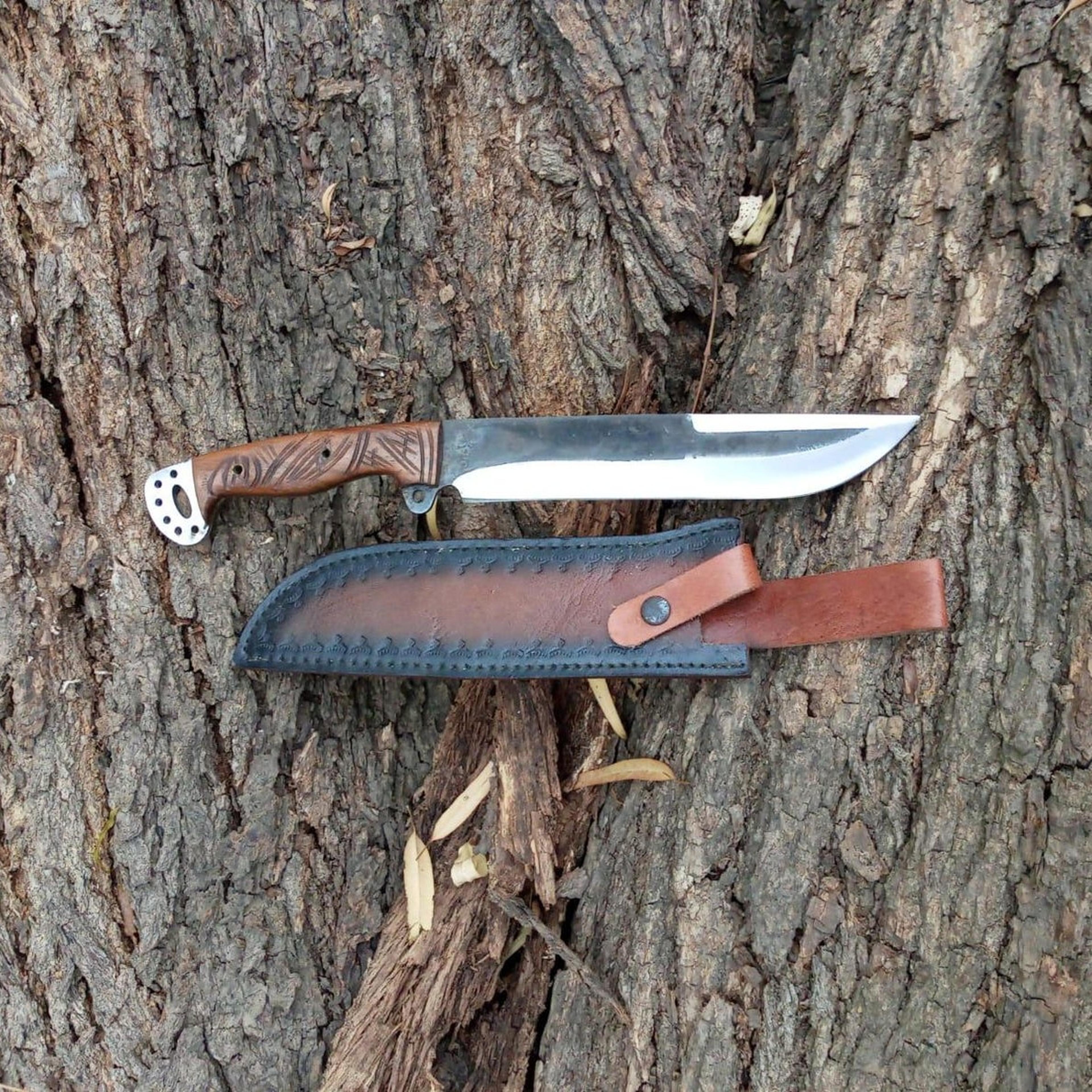17in rustic camp bowie knife with broad steel blade, carved wood handle & two-tone leather sheath
