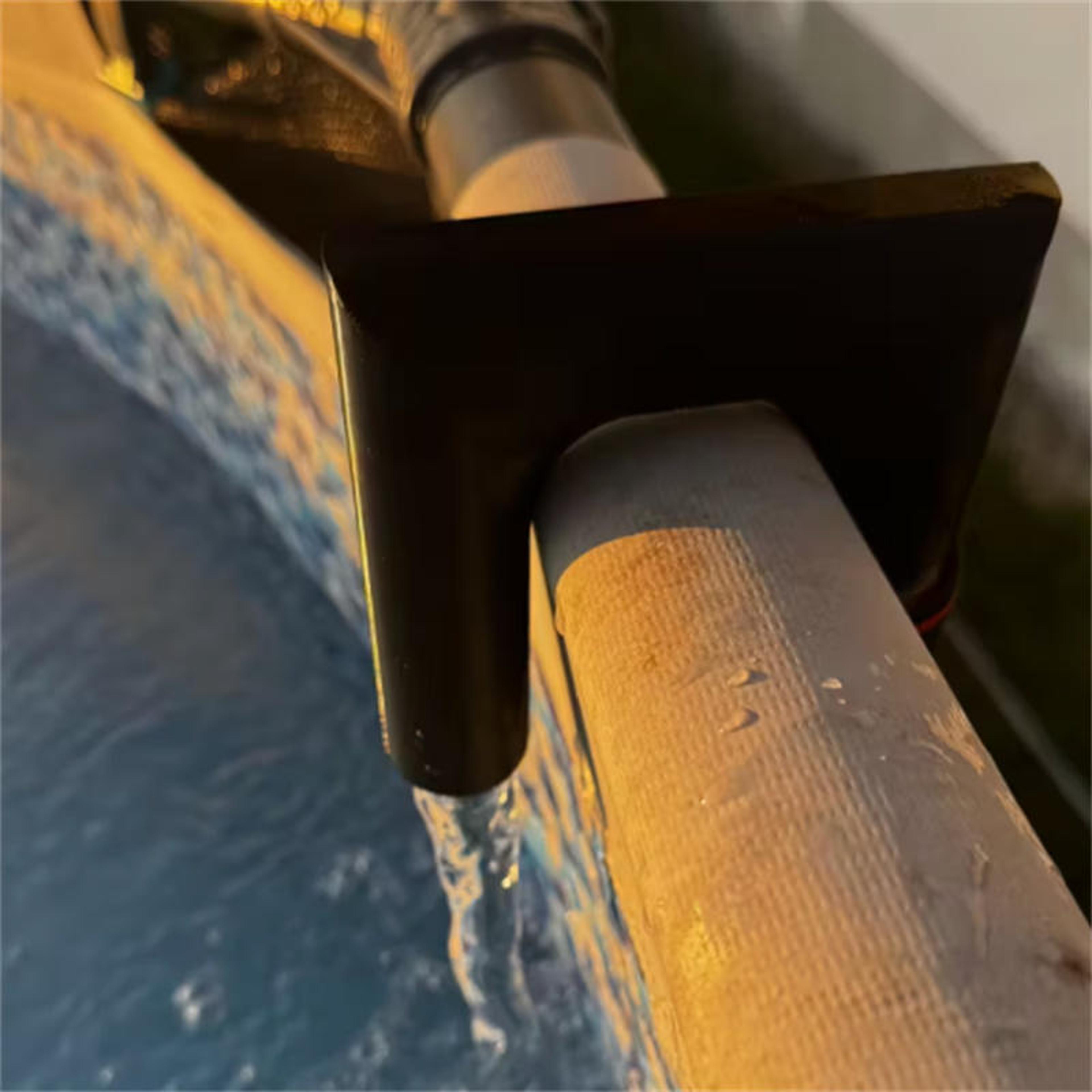 hands free garden hose holder hook for easy water tank filling and stable hose support