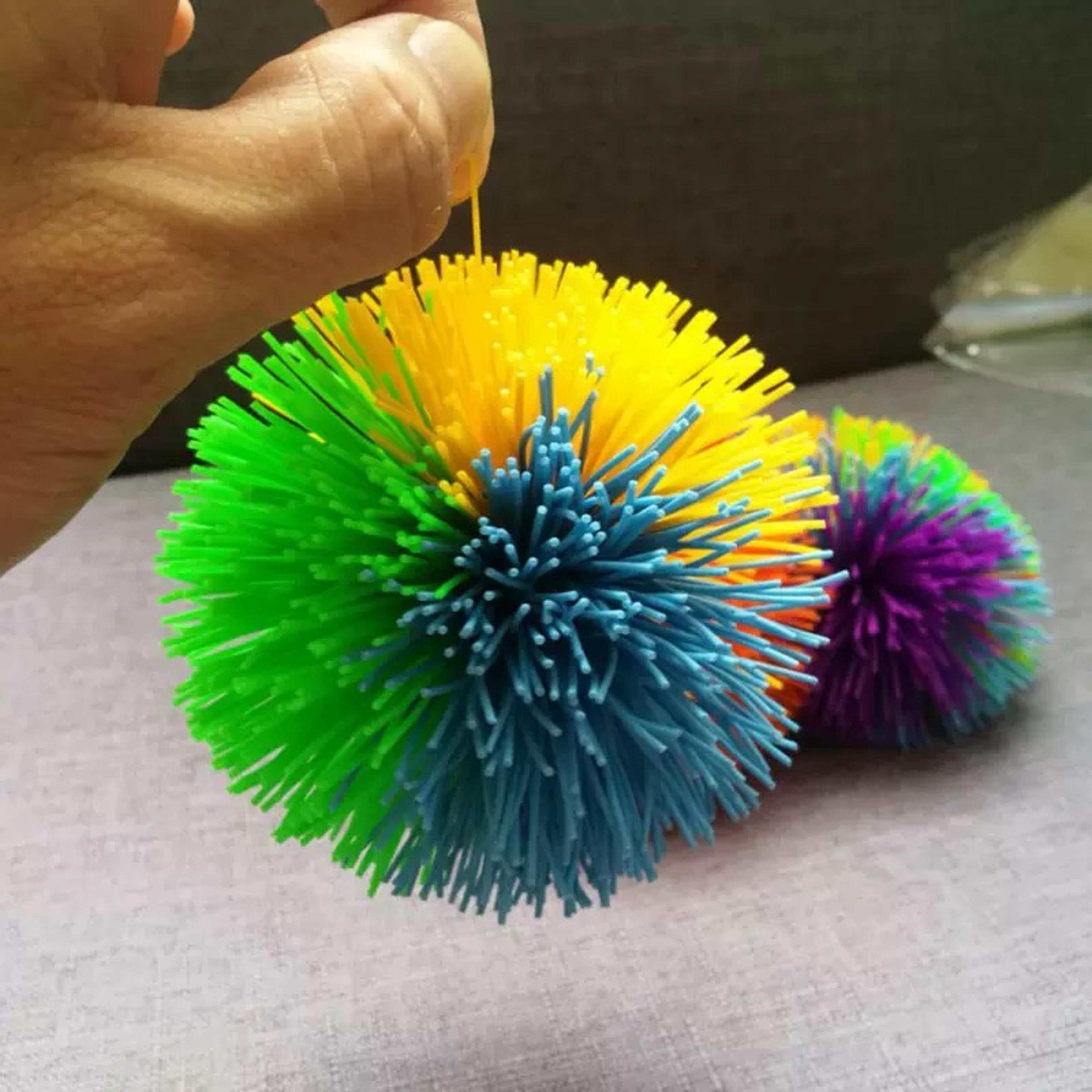 rainbow stringy ball sensory fidget toy for kids party favors and outdoor play