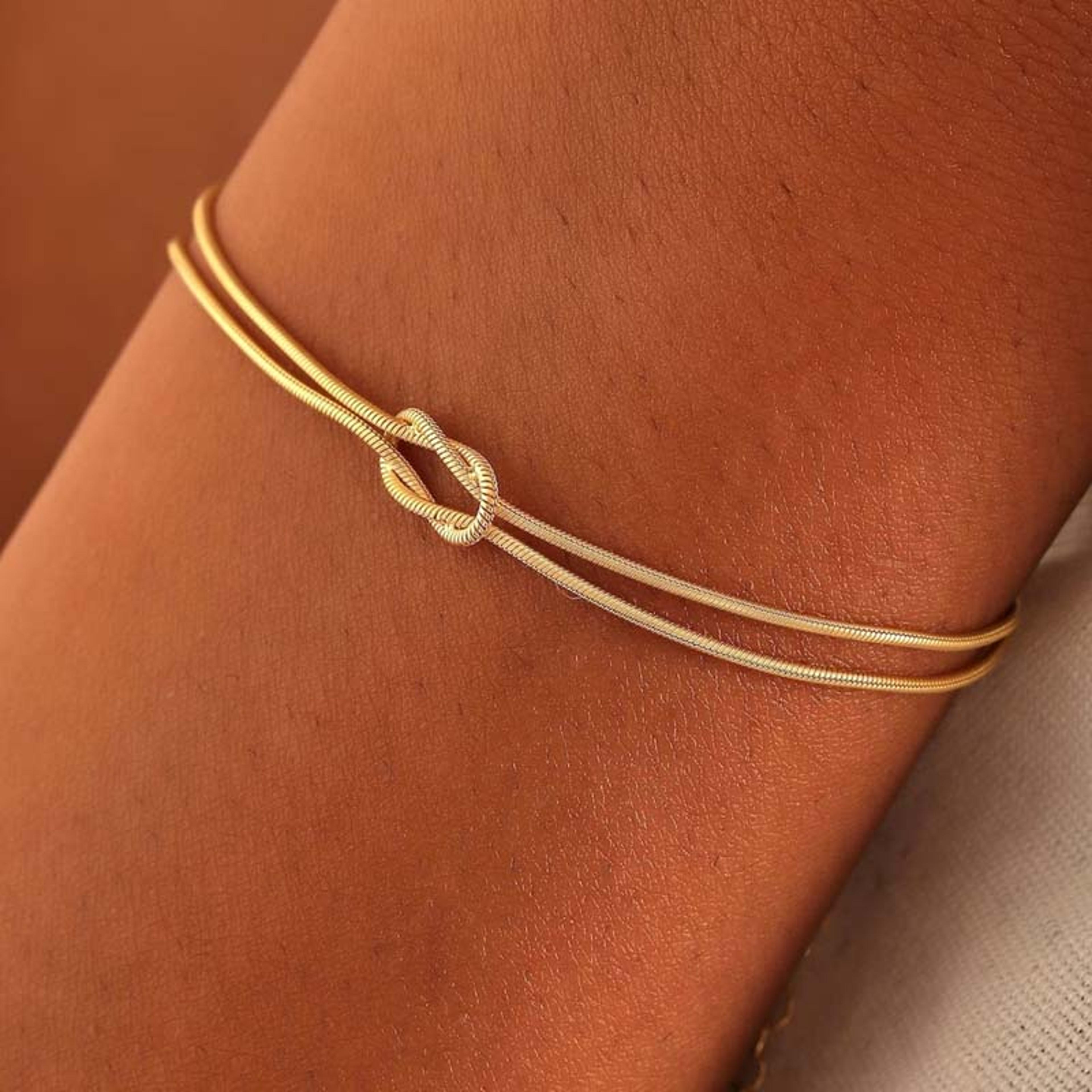 elegant stainless steel bracelet with knot design gold snake chain for women