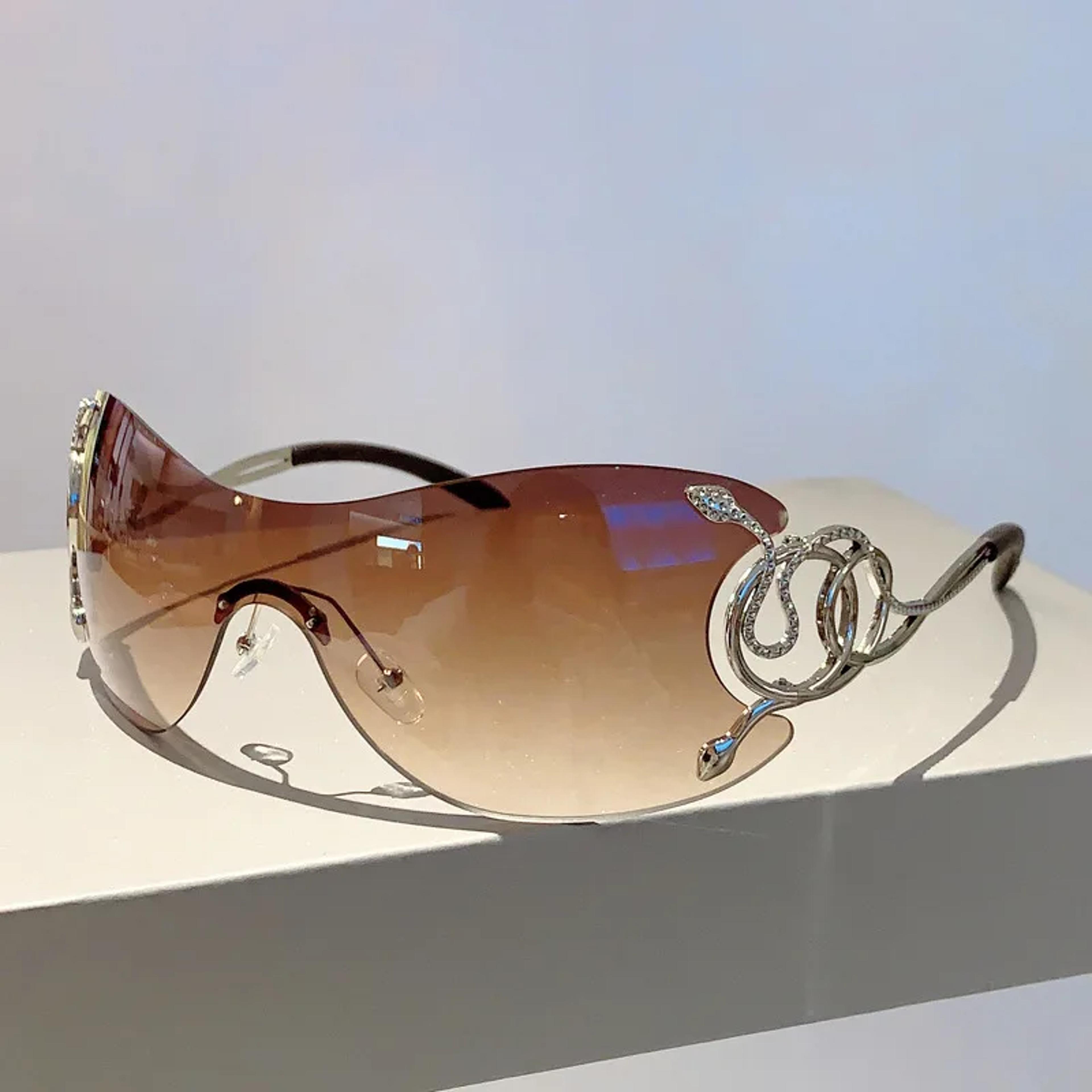 rimless wrap around oversized gradient sunglasses with snake temple design