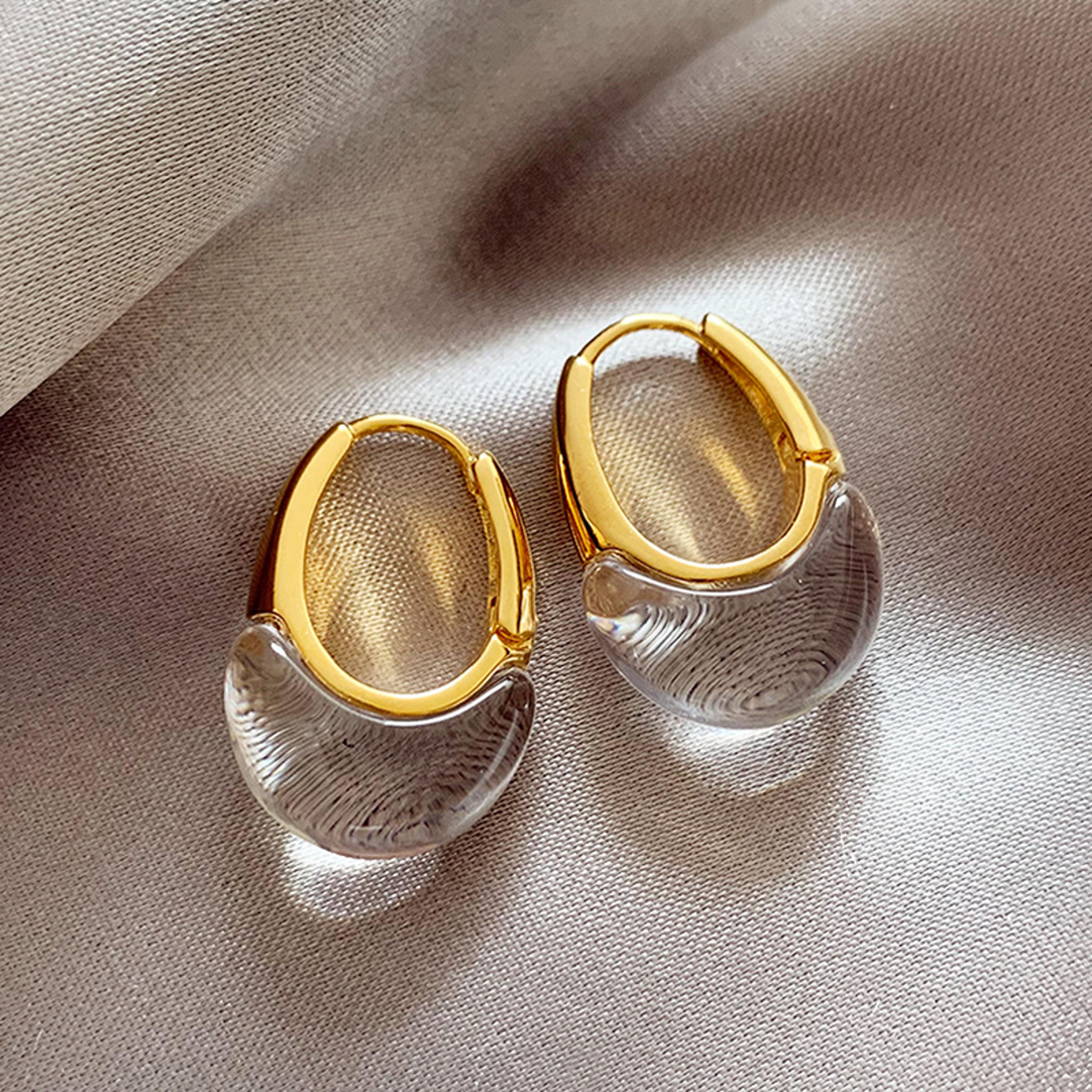 elegant gold plated stud earrings with transparent water drop design for women