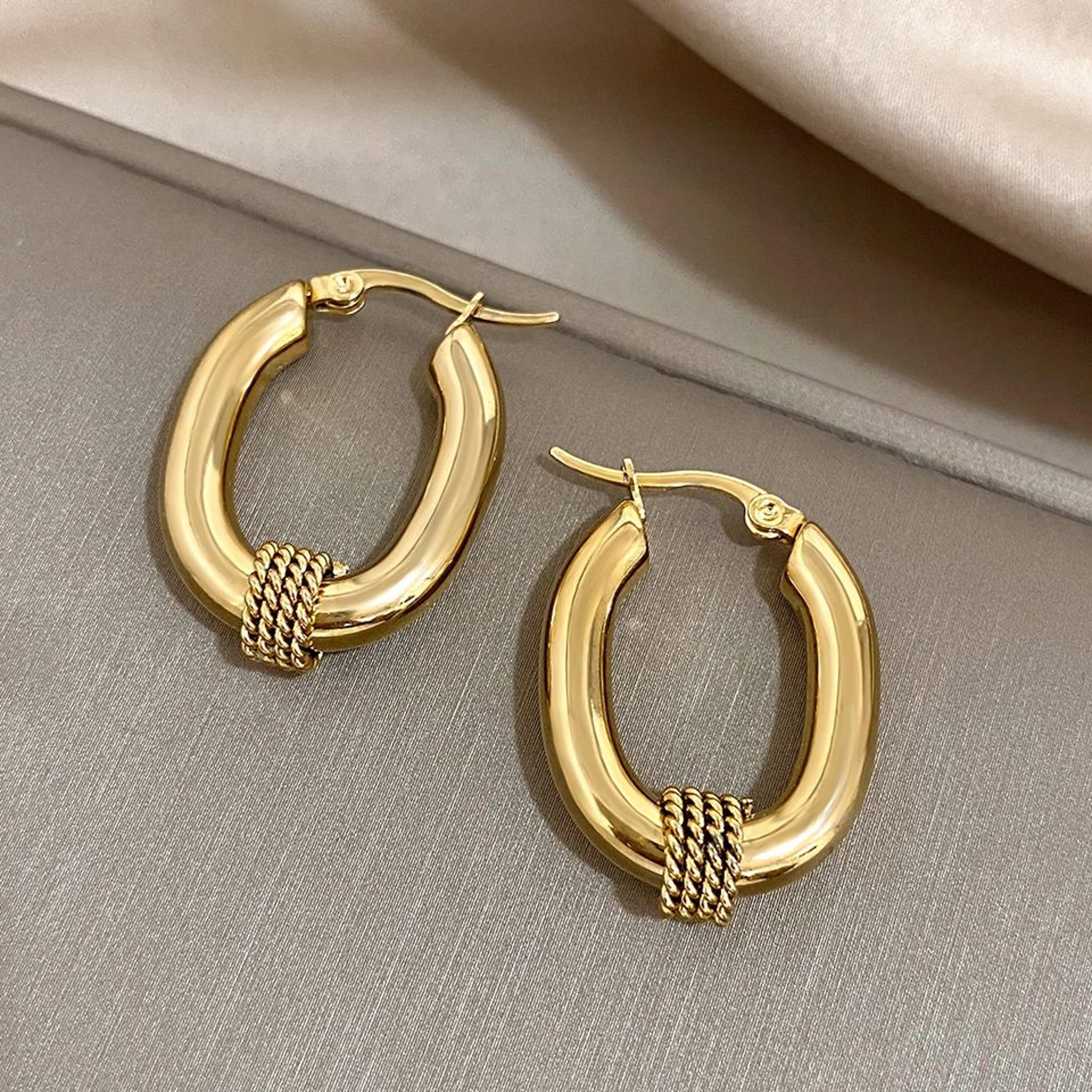luxe gold hoop earrings textured stainless steel earrings with hollow oval design