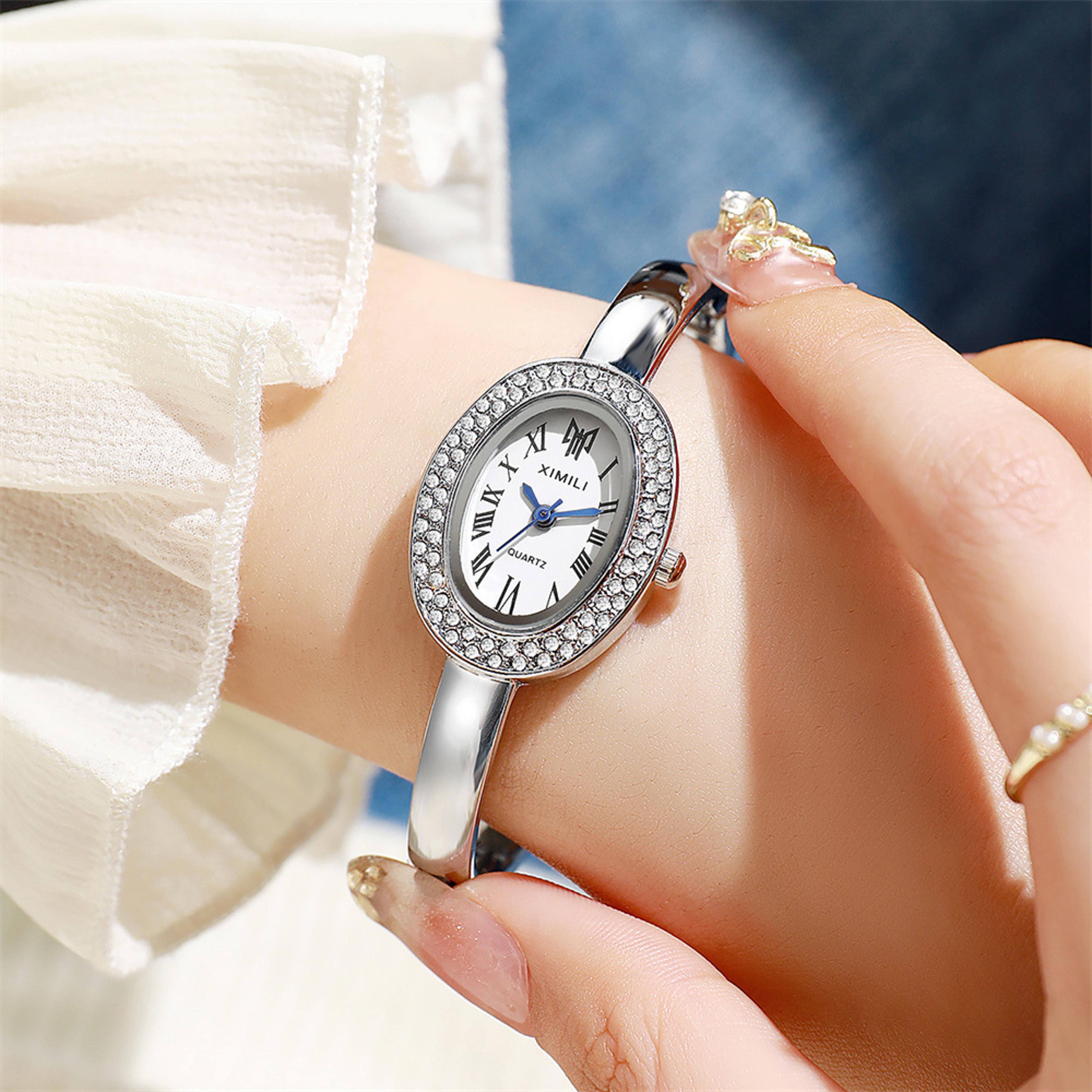 luxury women's bracelet watch with oval roman dial & quartz movement