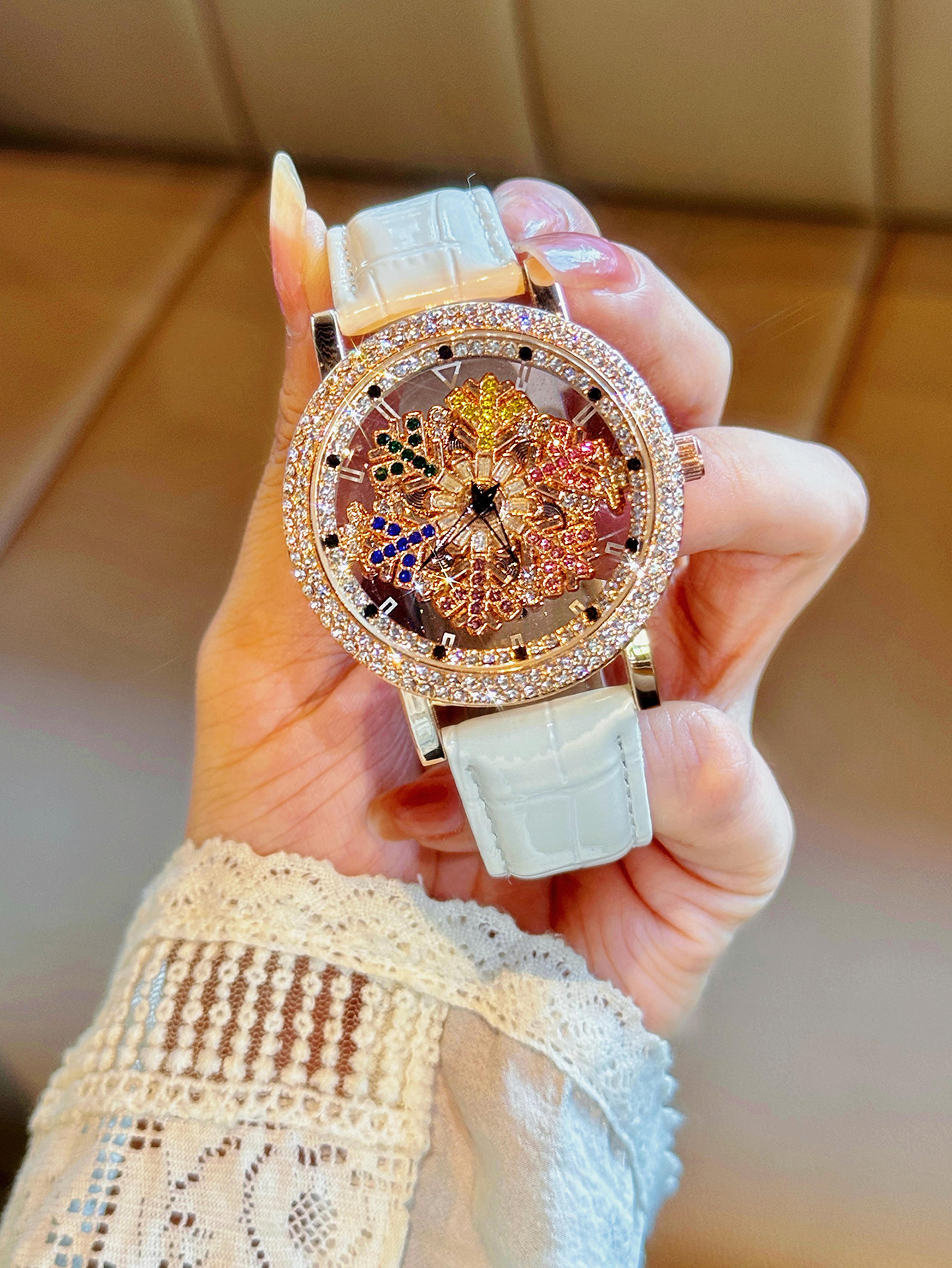 luxury quartz watch for women with rotating snowflake dial & leather strap