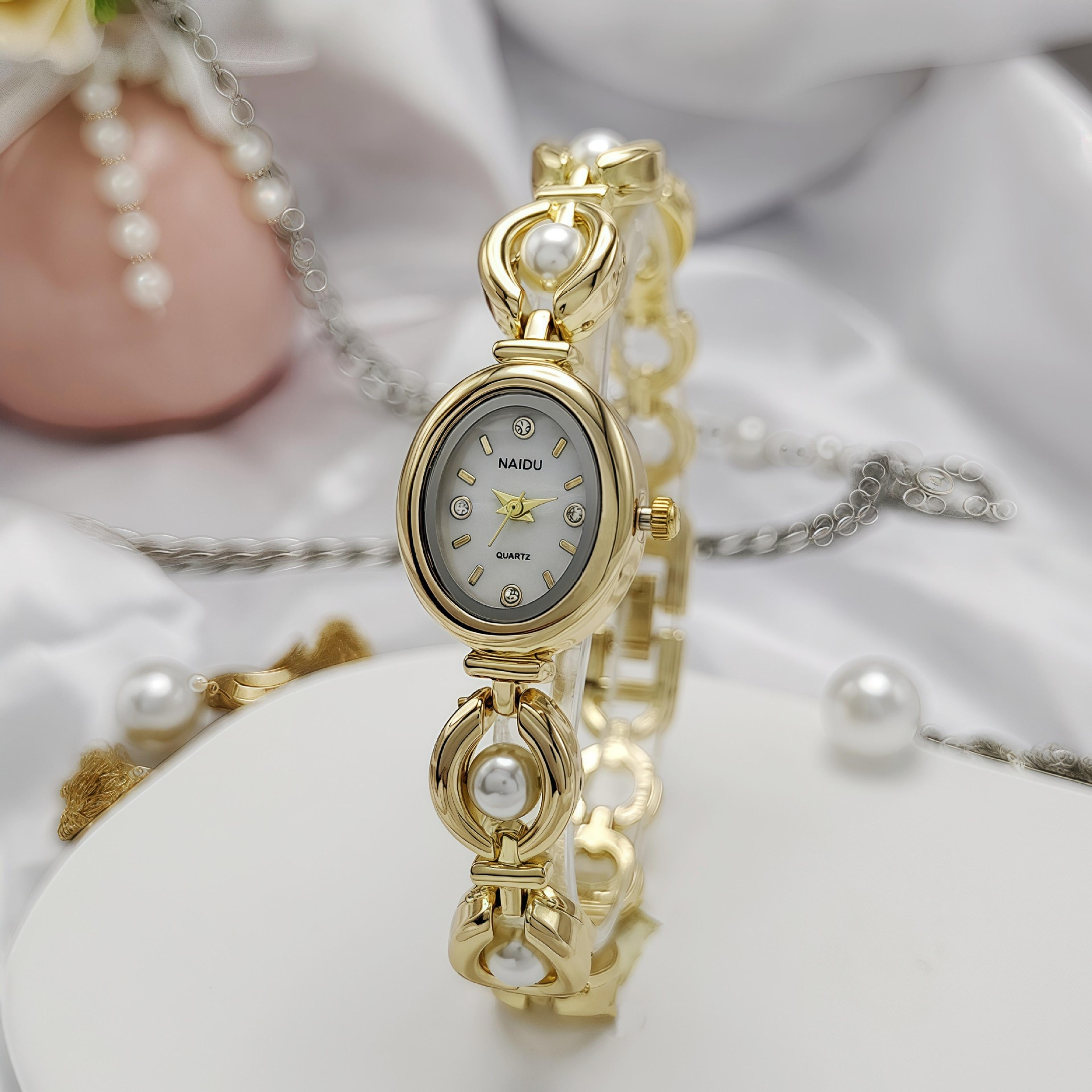 elegant women's bracelet watch with oval quartz dial & pearl style bracelet