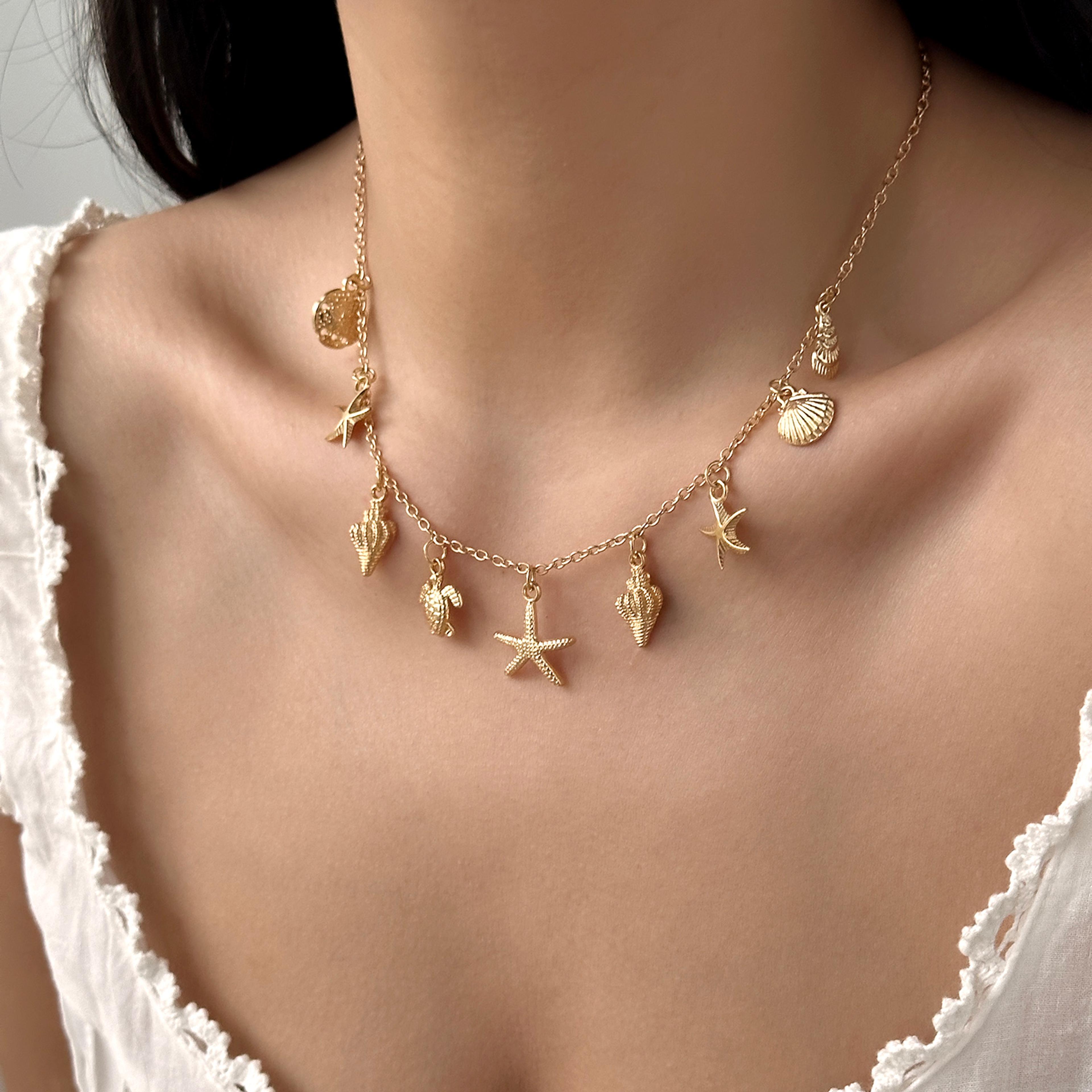 gold starfish & shell pendant necklace for women – beach jewelry ocean-inspired coastal necklace