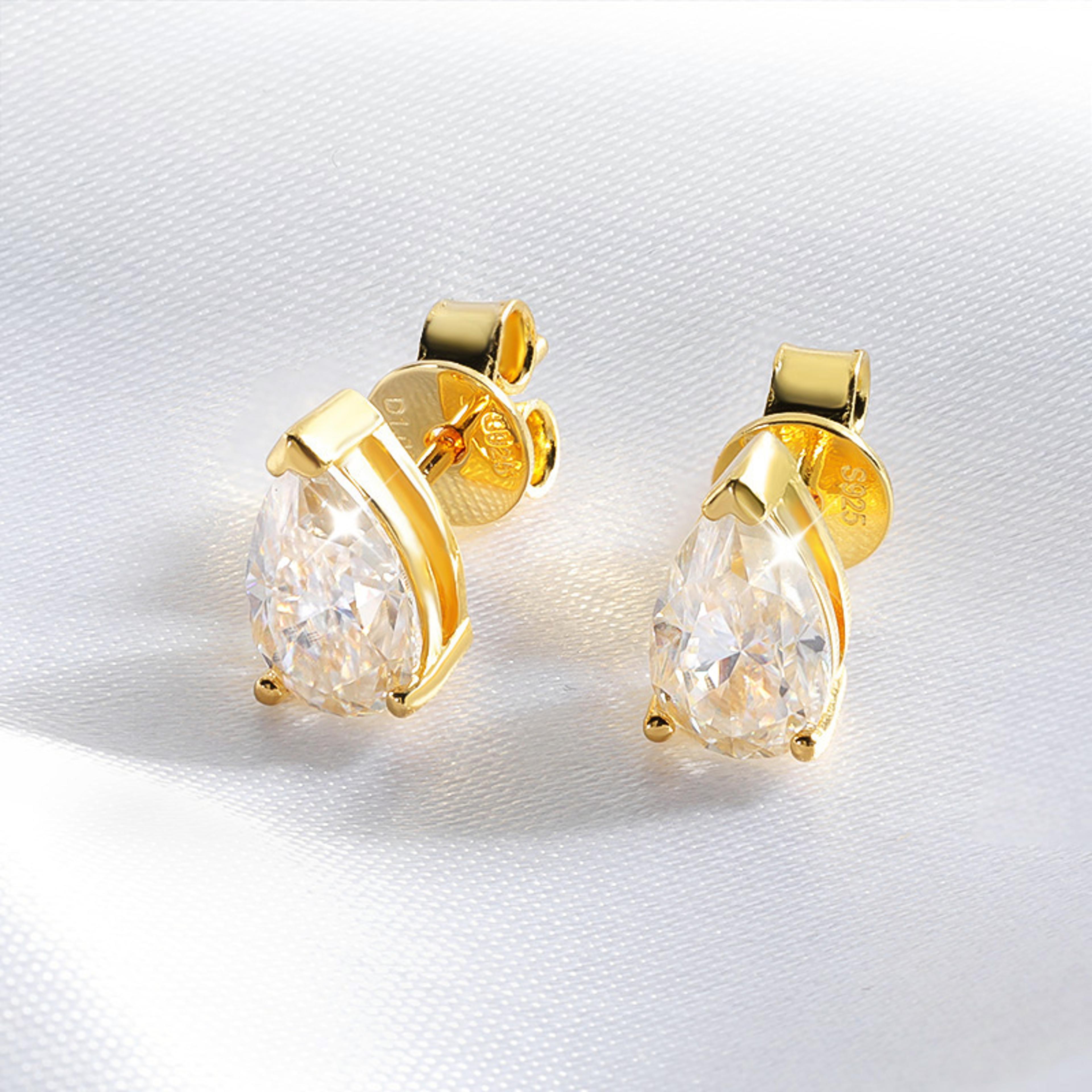 pear cut moissanite stud earrings in 925 sterling silver