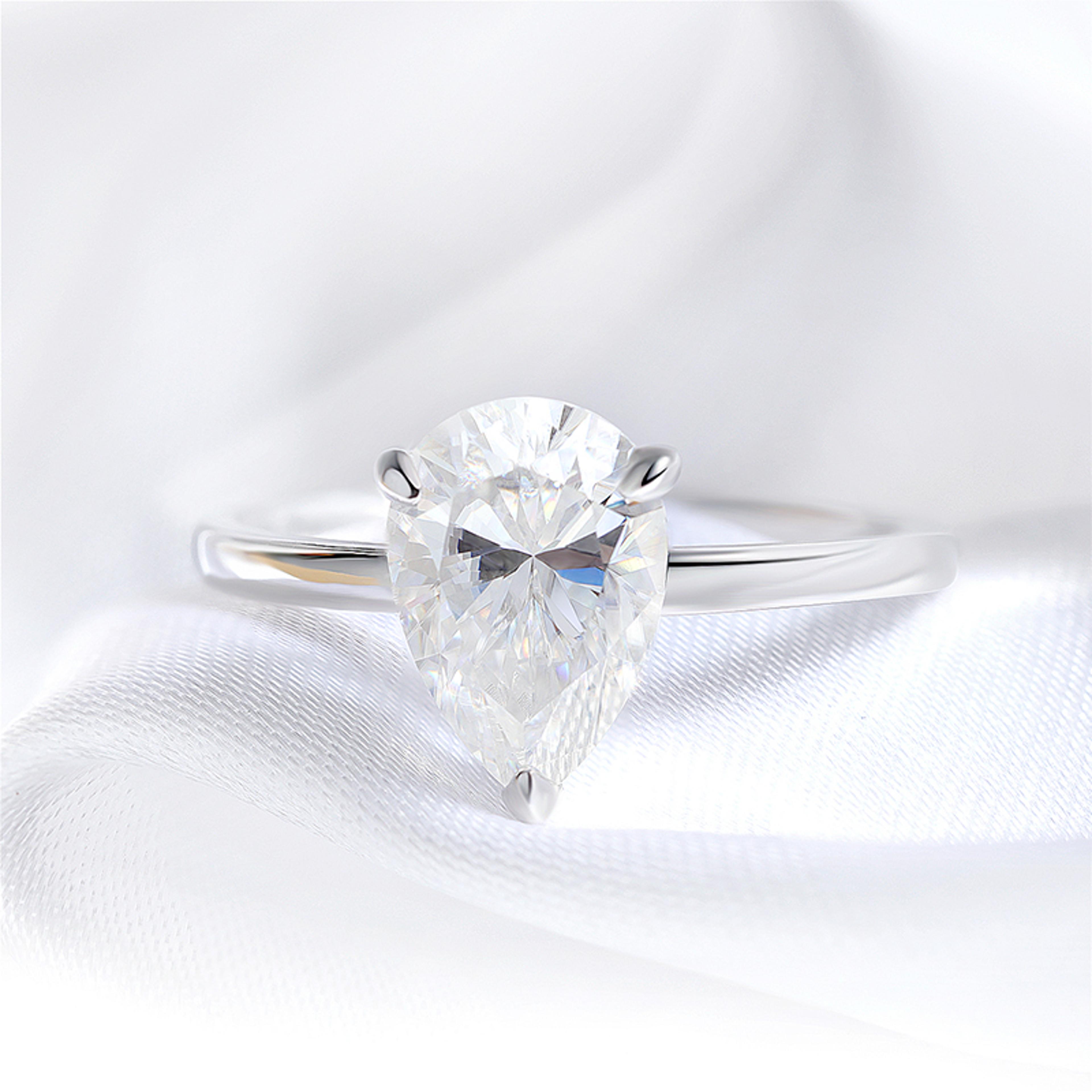 pear cut moissanite solitaire engagement ring in 925 sterling silver