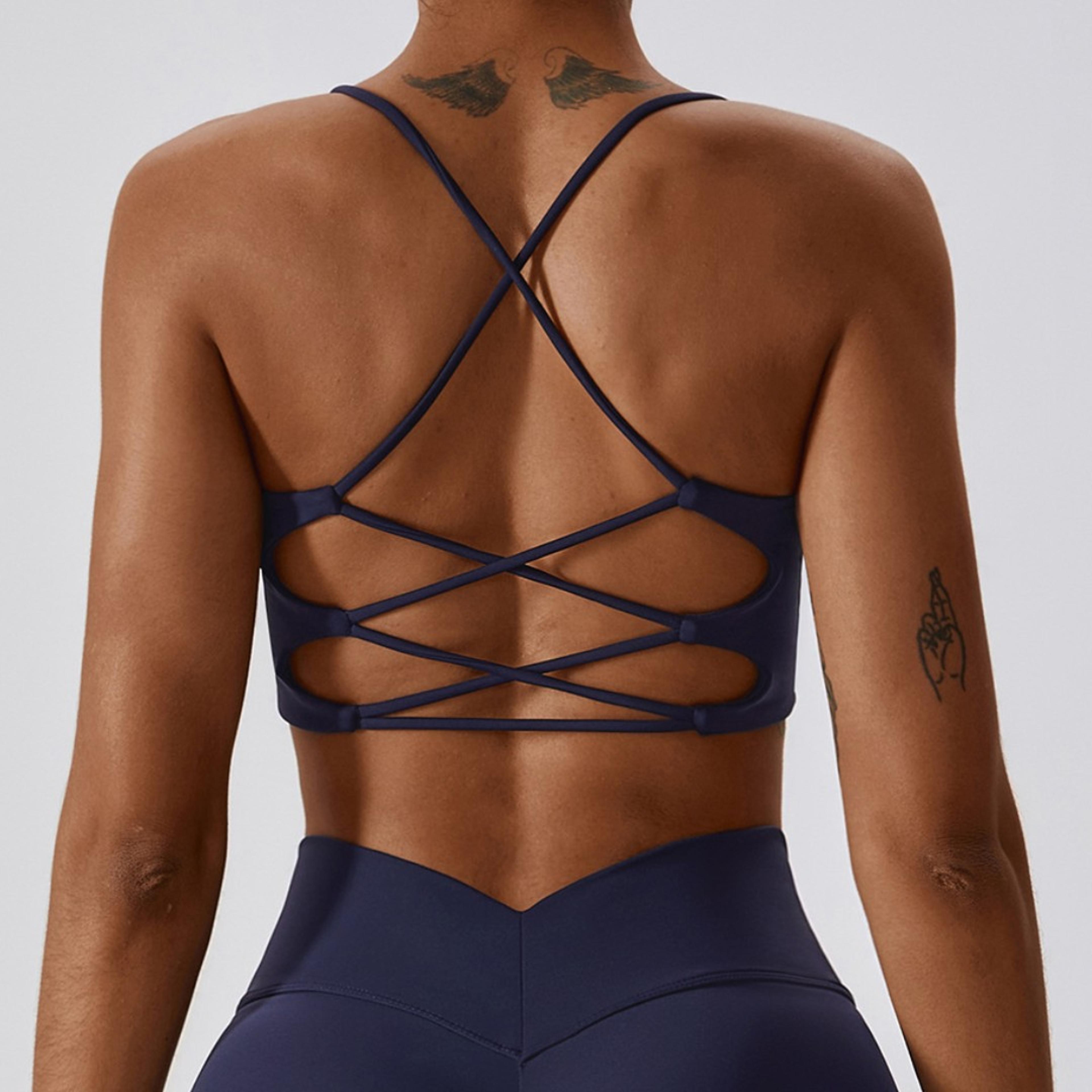 women's cross back sports bra with spaghetti straps for fitness and yoga