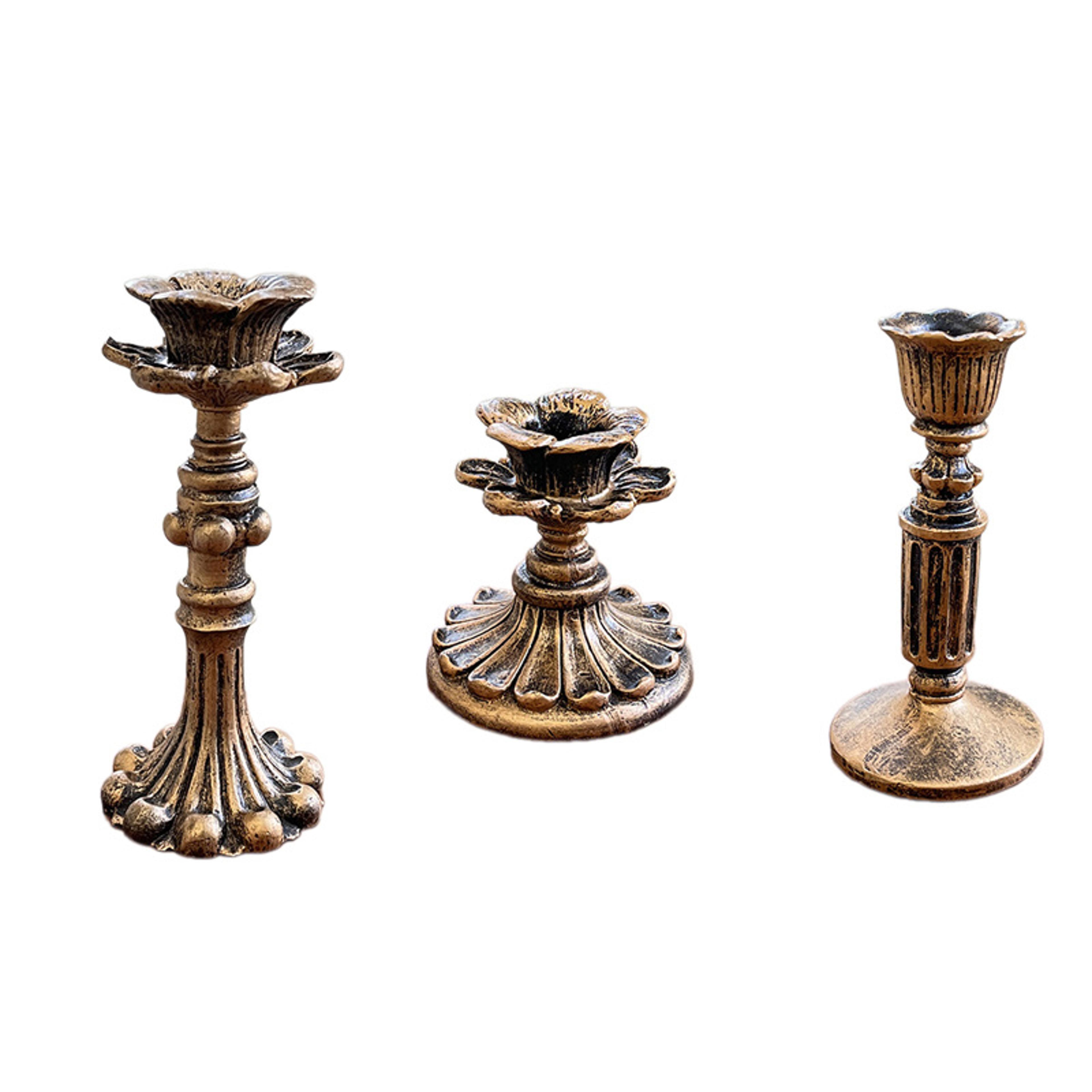 vintage taper candle holder with antique bronze finish resin design