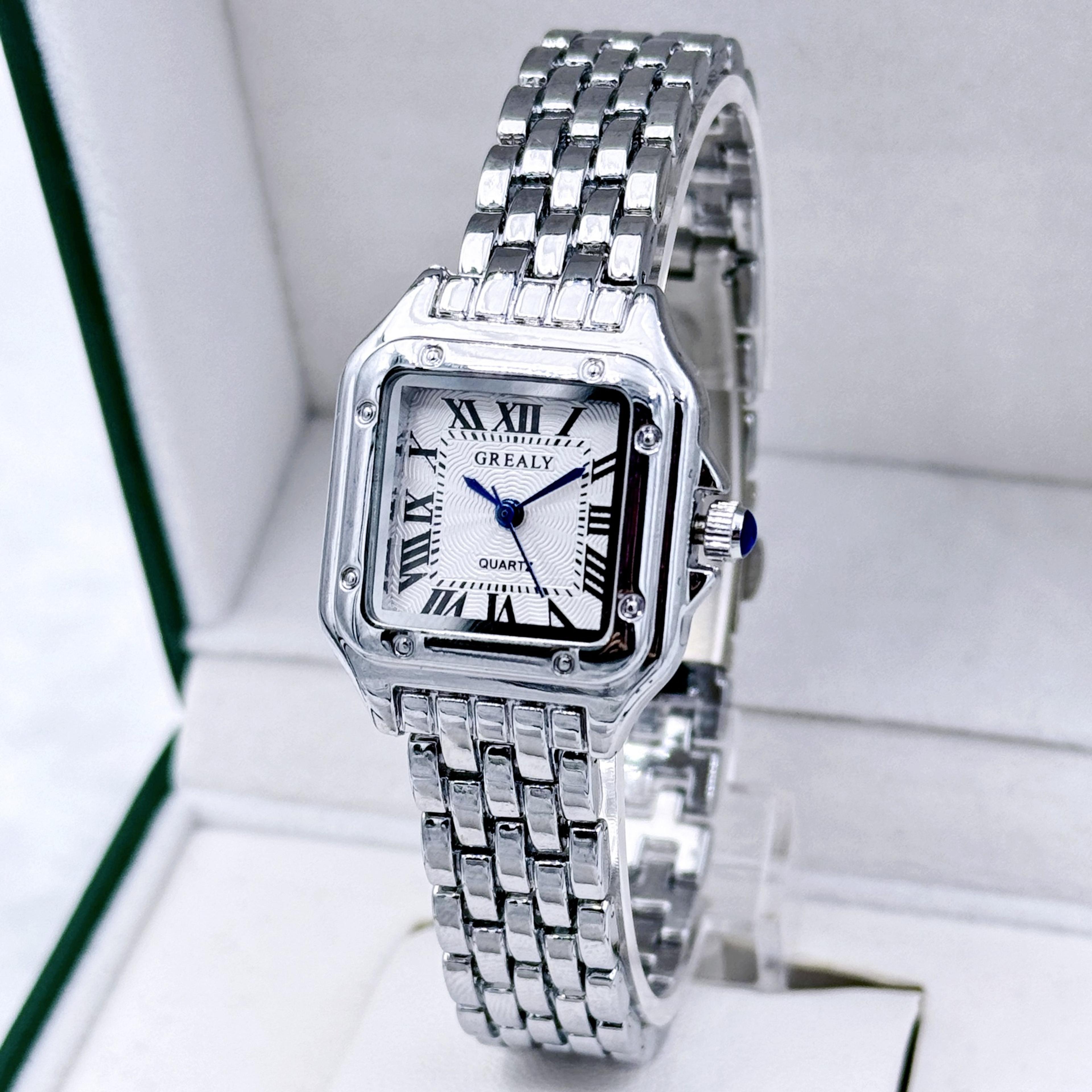 women's gold stainless steel quartz watch with roman numeral dial
