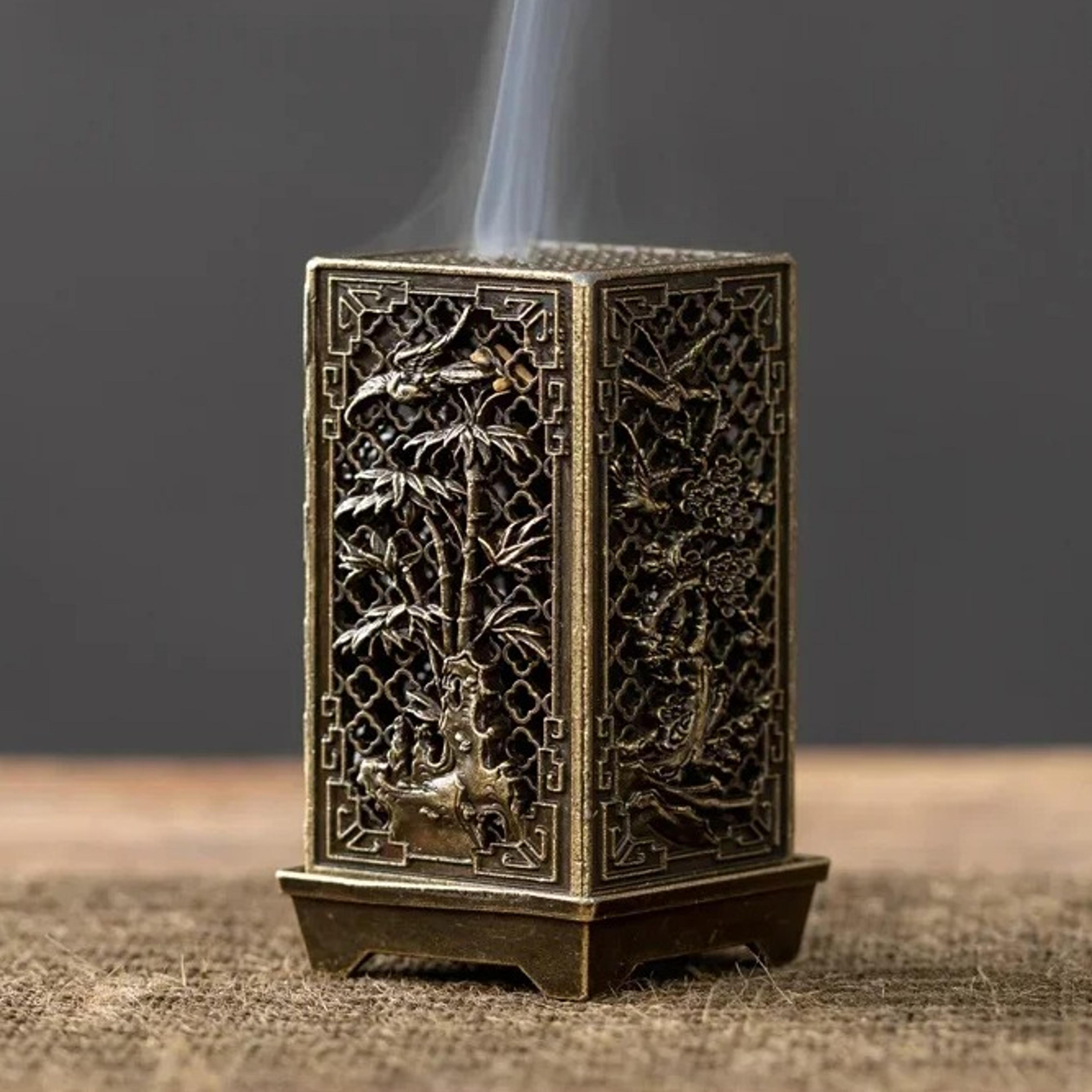 square vertical metal incense burner with bamboo and plum design for indoor aromatherapy