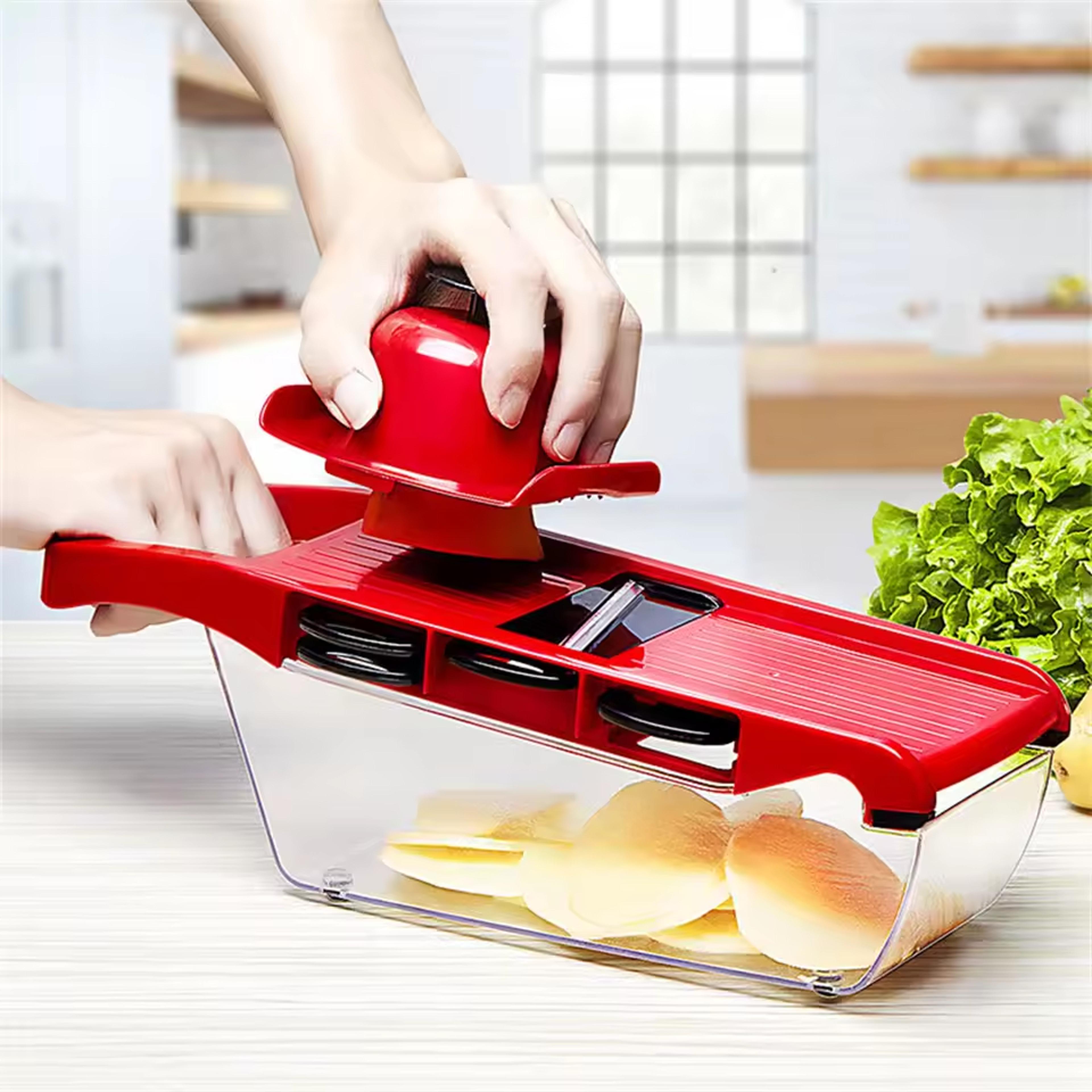 multi blade vegetable slicer and mandoline cutter with food container and peeler