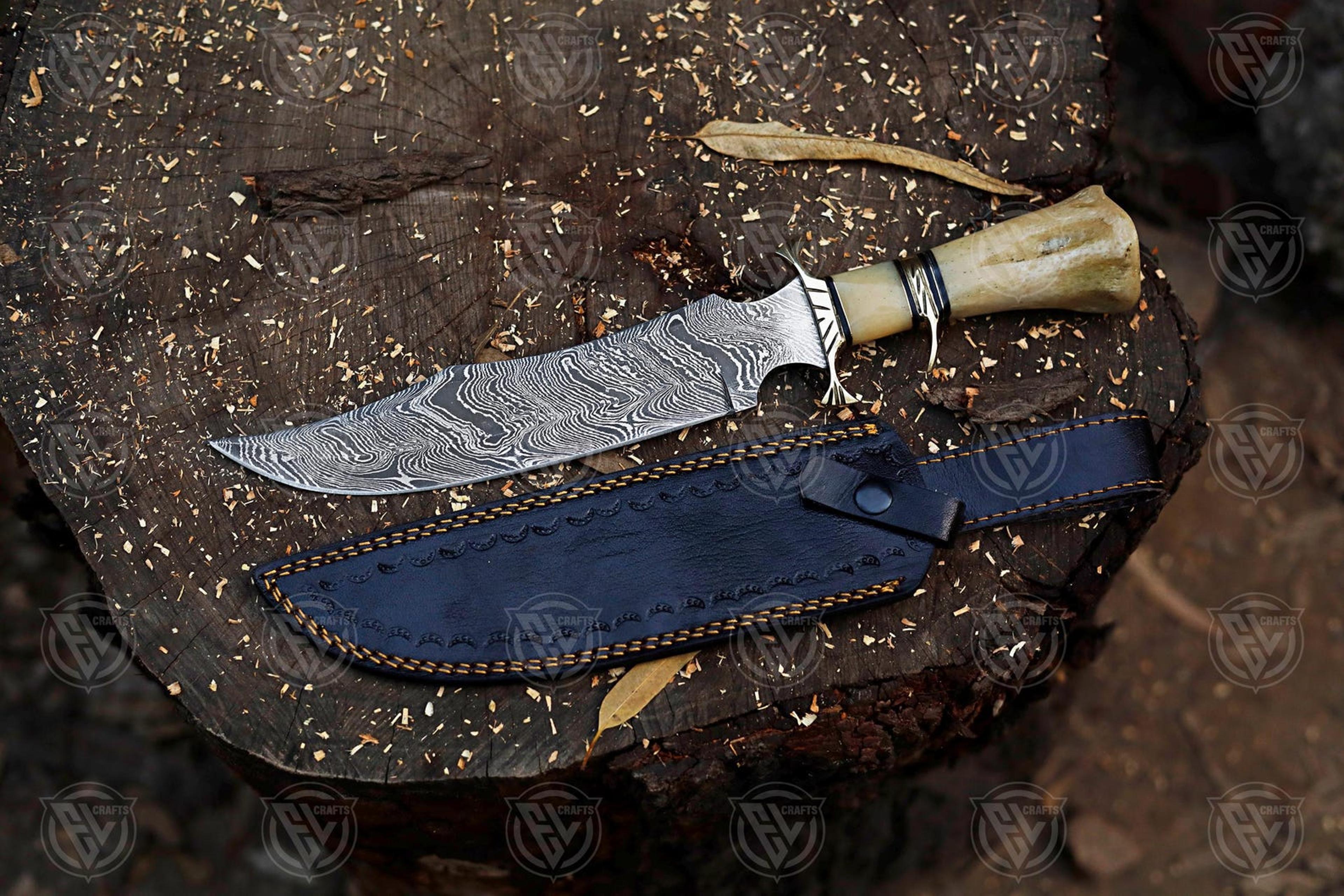 exquisite handcrafted damascus steel bowie knife with unique camel bone handle and leather sheath