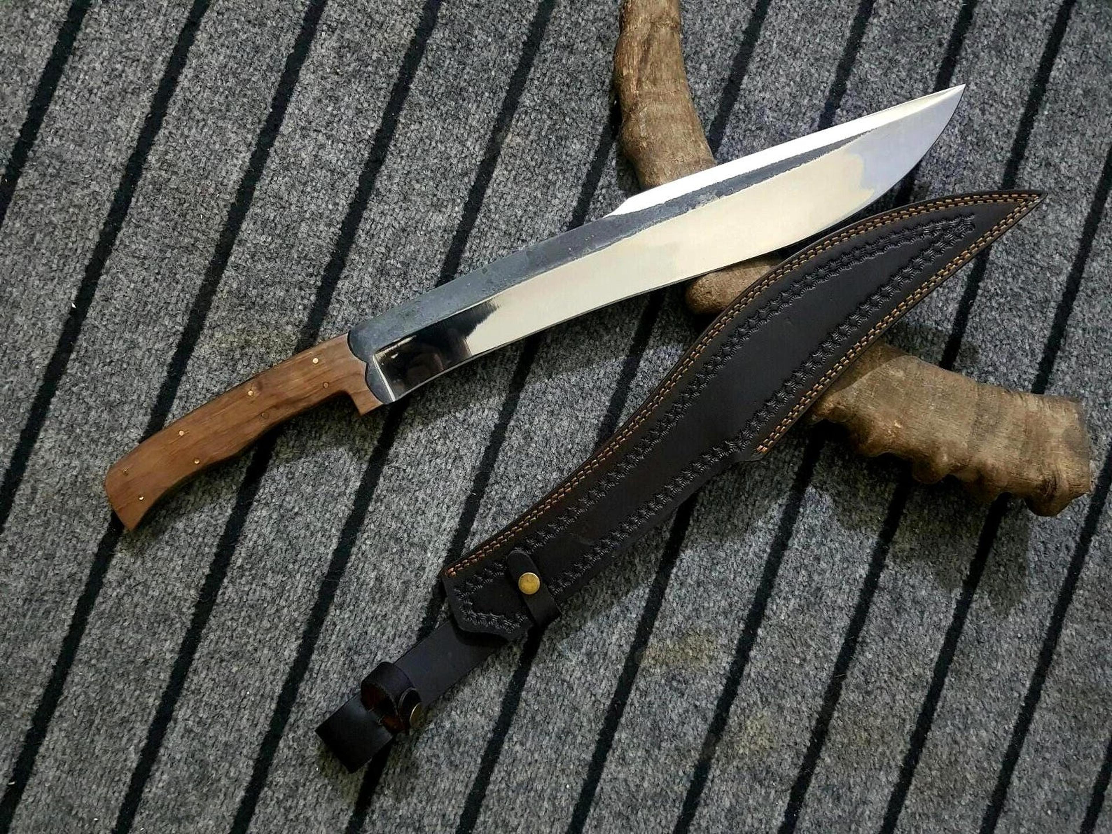 handcrafted high carbon steel kukri machete with hardwood handle, leather sheath & frontier collector blade
