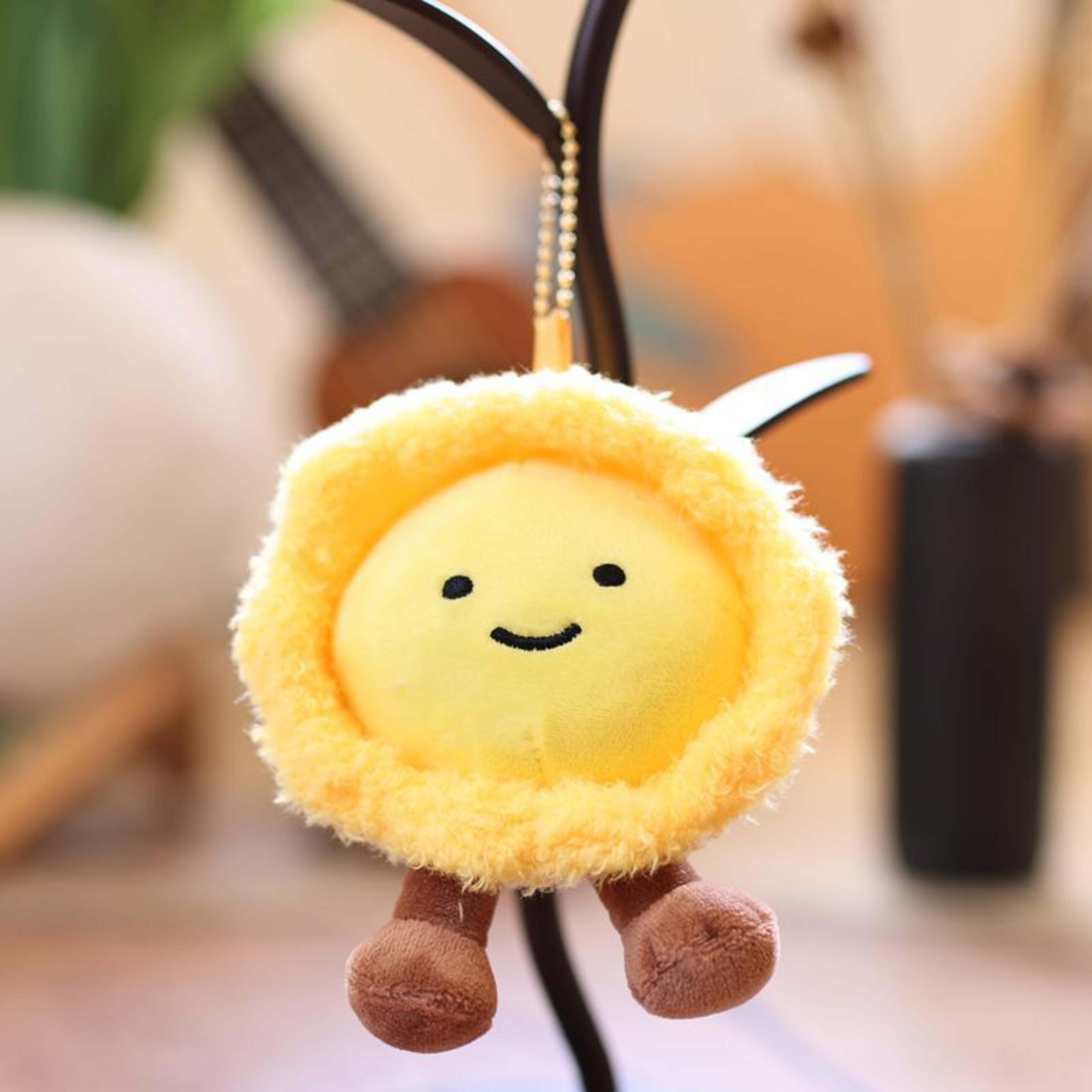 plush egg tart keychain sunflower pendant, cute plushie toy, creative bag accessories for women.