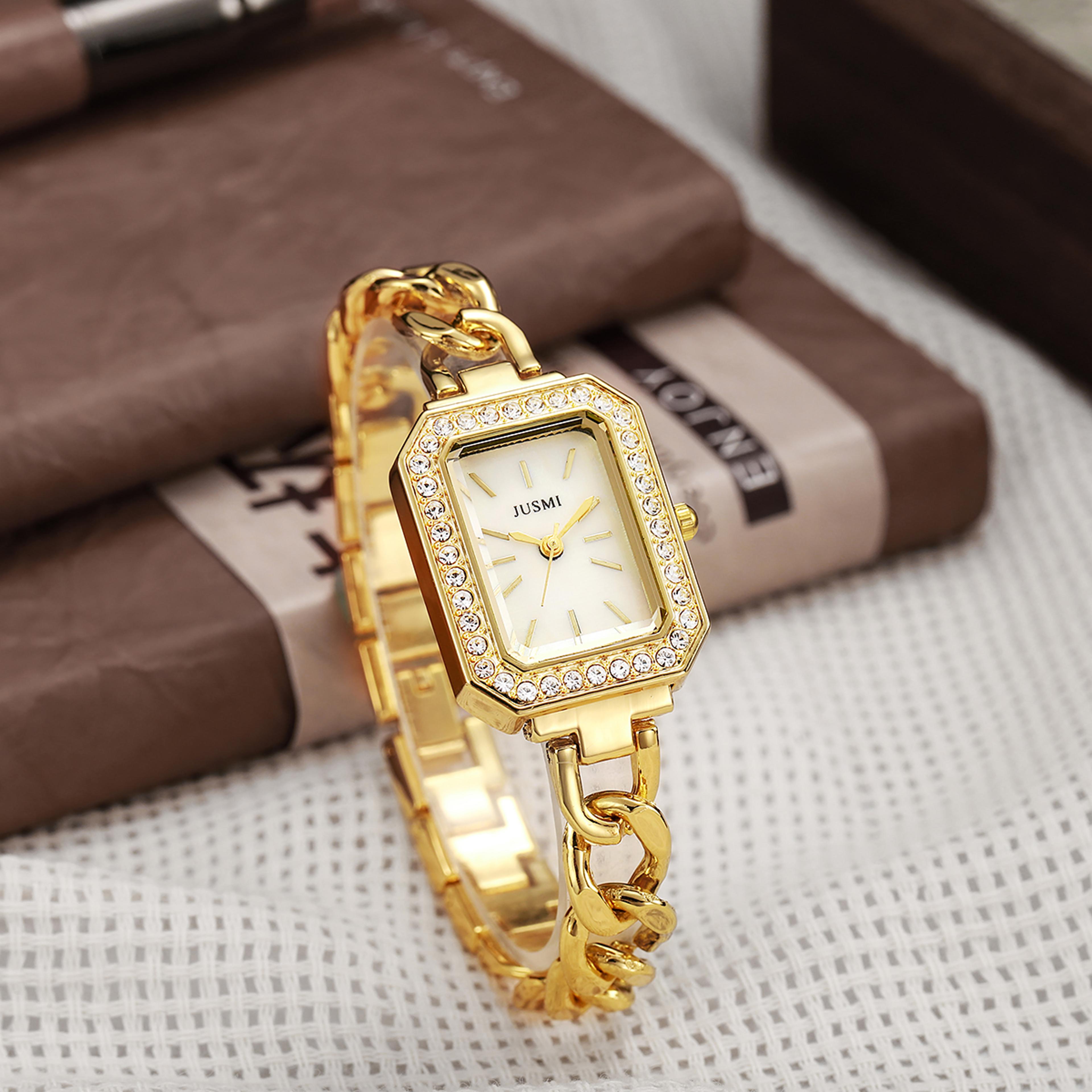ladies luxury quartz watch with diamond-inlaid buckle and steel strip