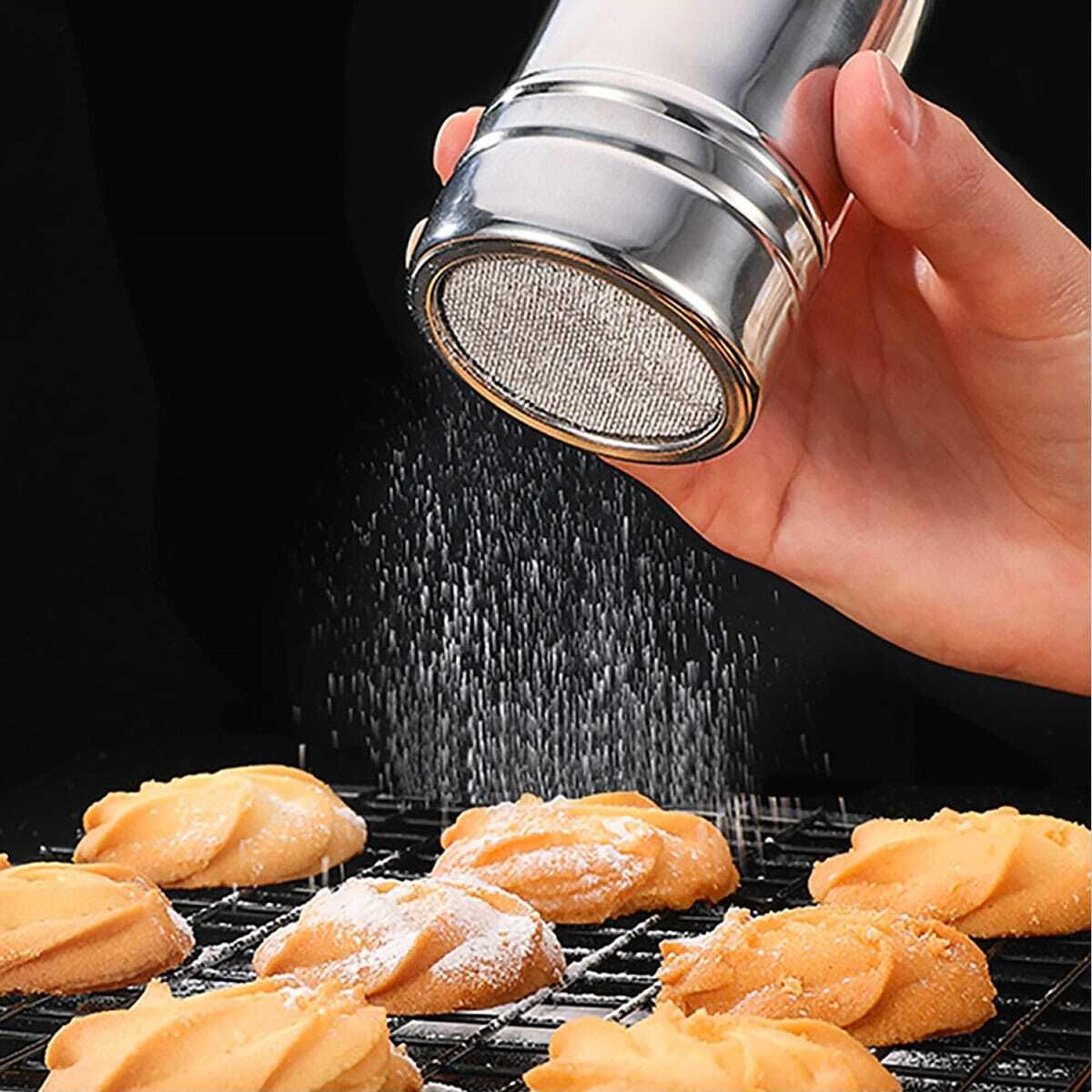 silver stainless steel spice shaker set salt, sugar, pepper, cocoa, and icing powder dispensers