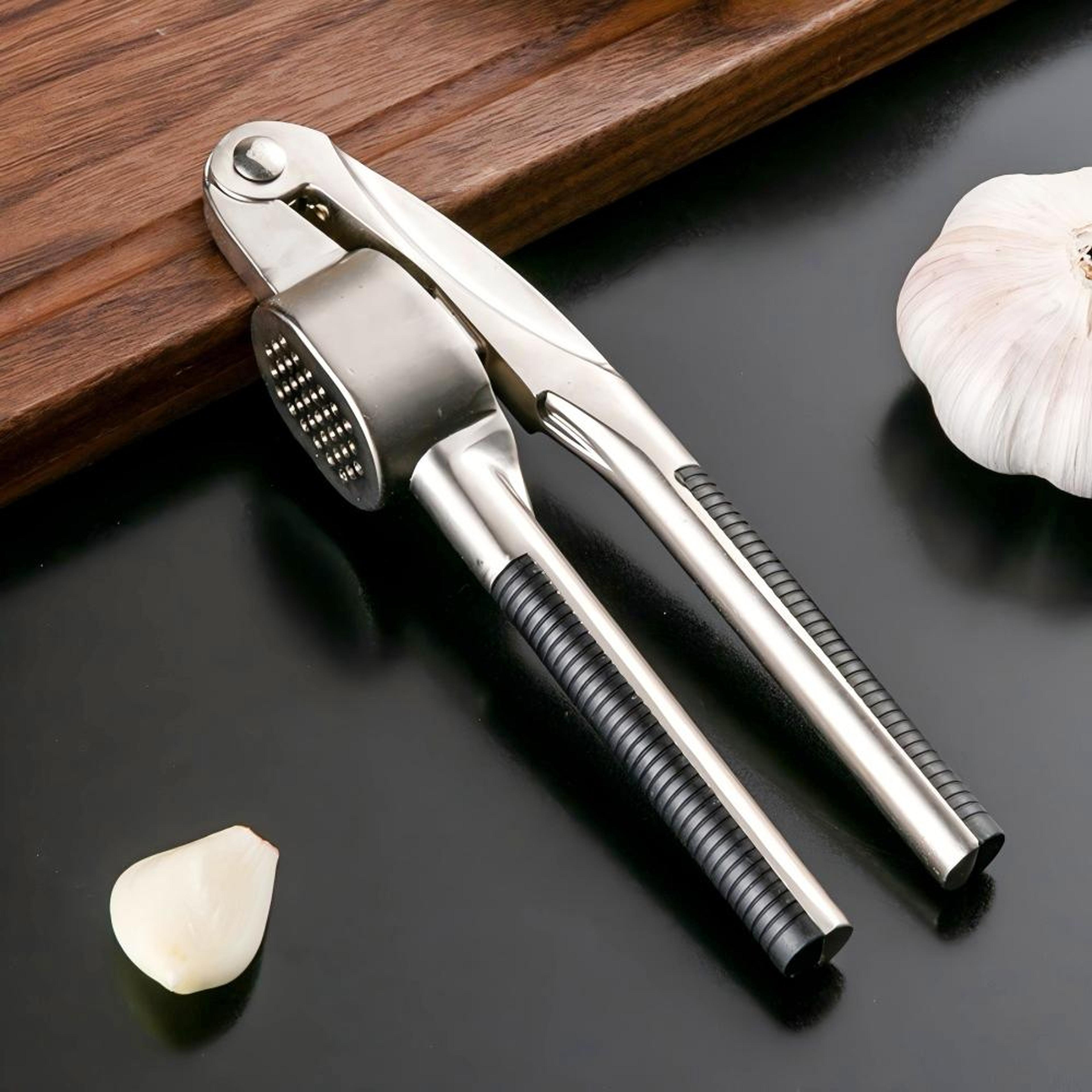 ergonomic stainless steel garlic press easy to use & clean mincer crusher for effortless garlic preparation