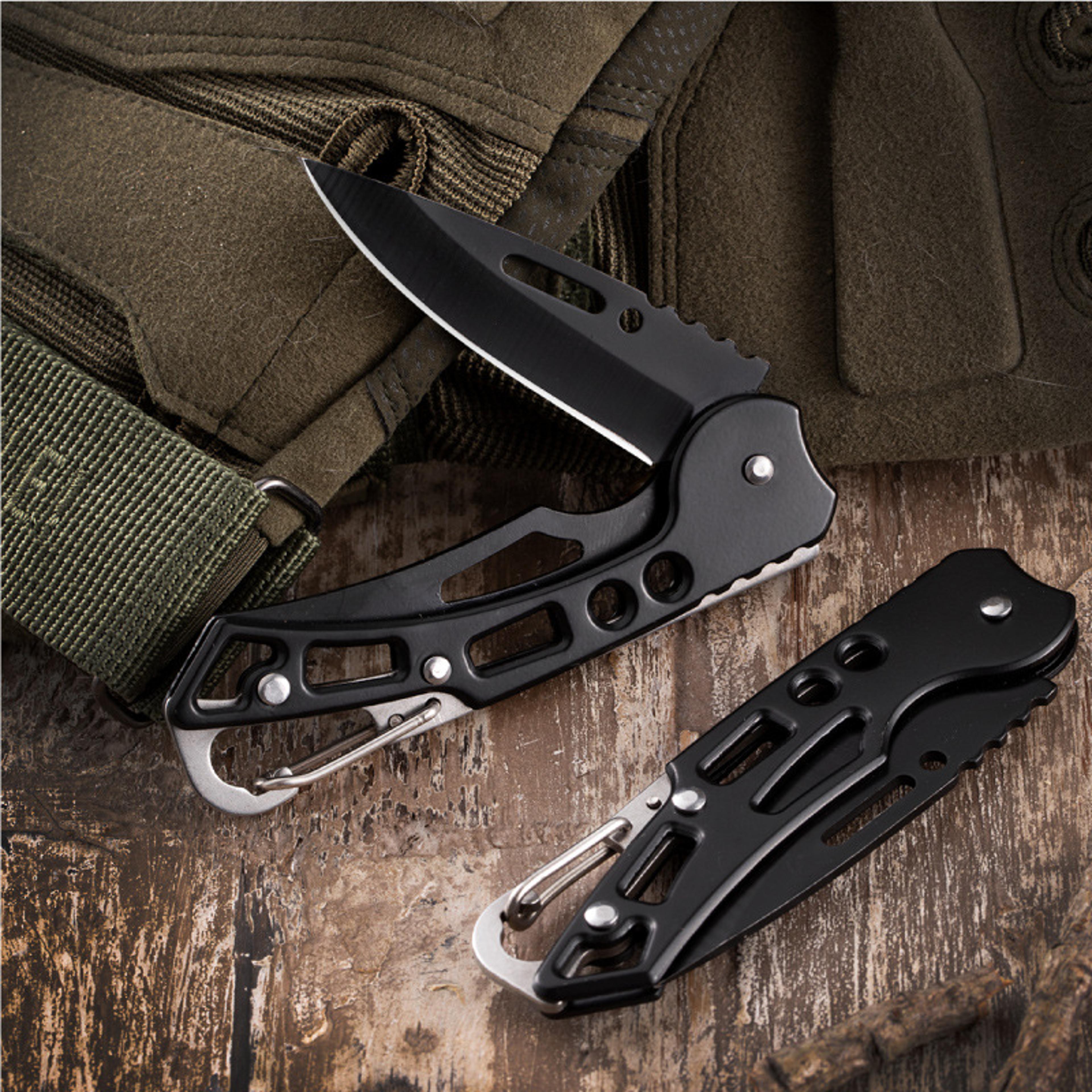 portable stainless steel folding knife compact survival tool for camping, hunting, and outdoor adventures