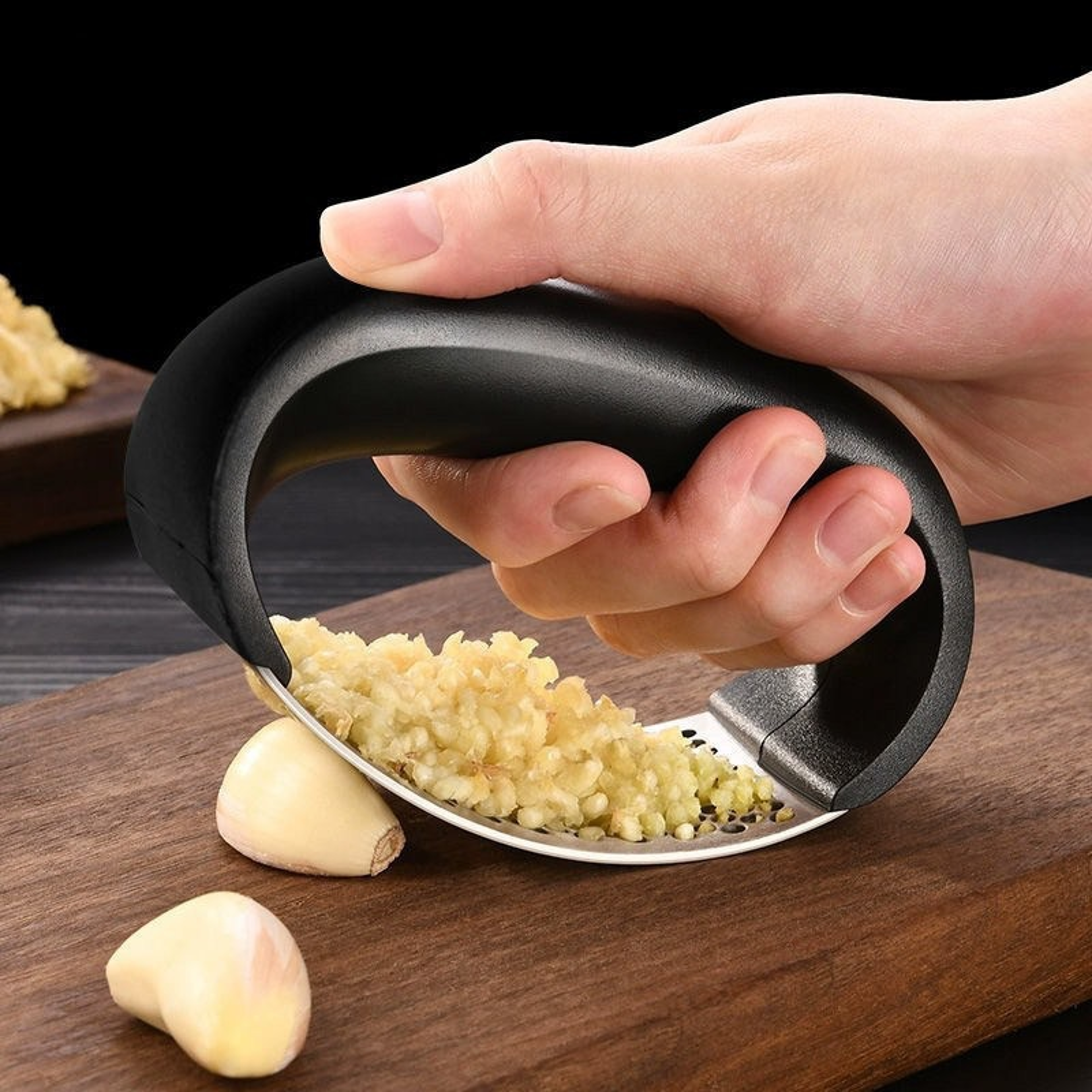 stainless steel garlic rocker press with peeler and cleaning brush for easy garlic mincing
