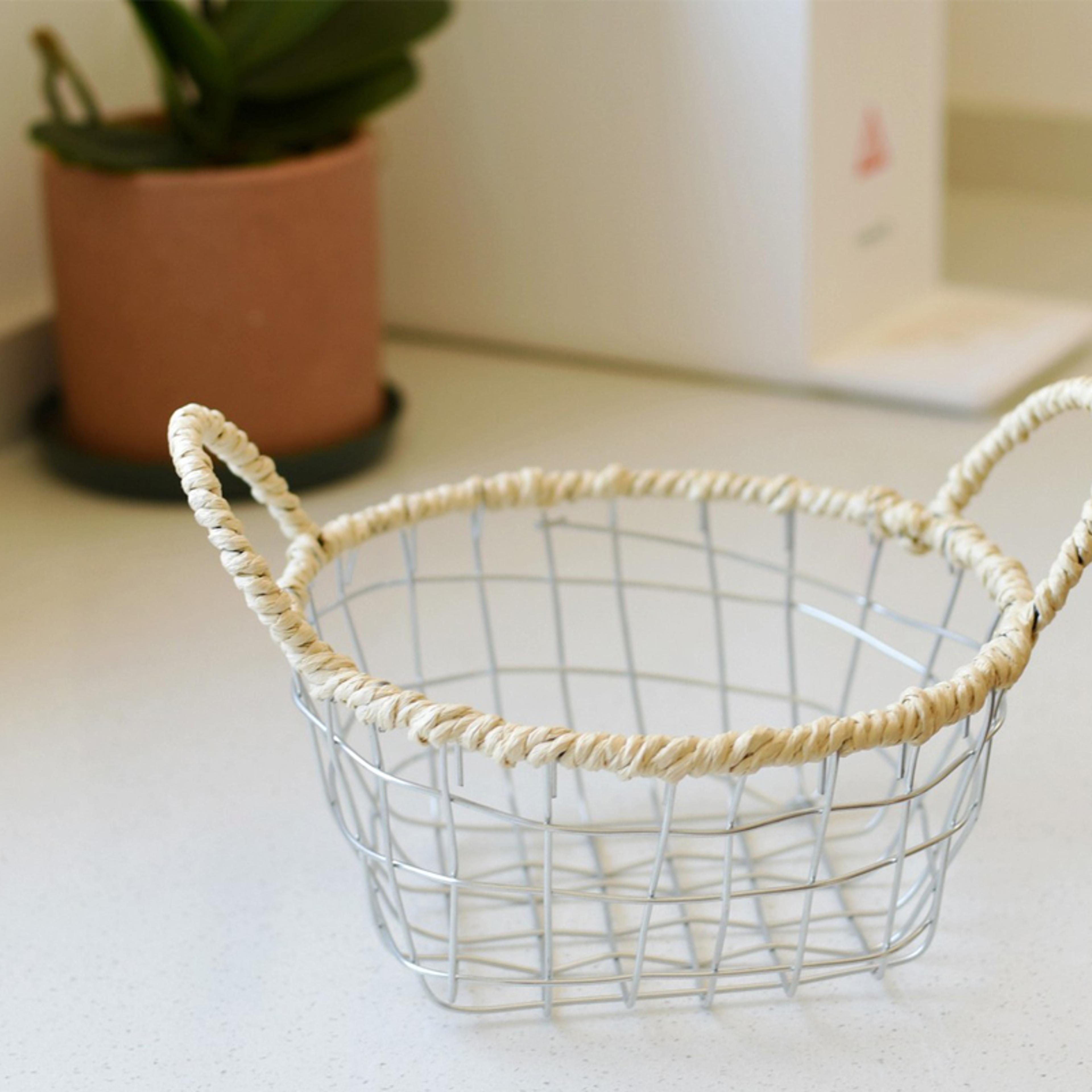 iron woven storage basket with handles for kitchen bread snacks and coffee table organization