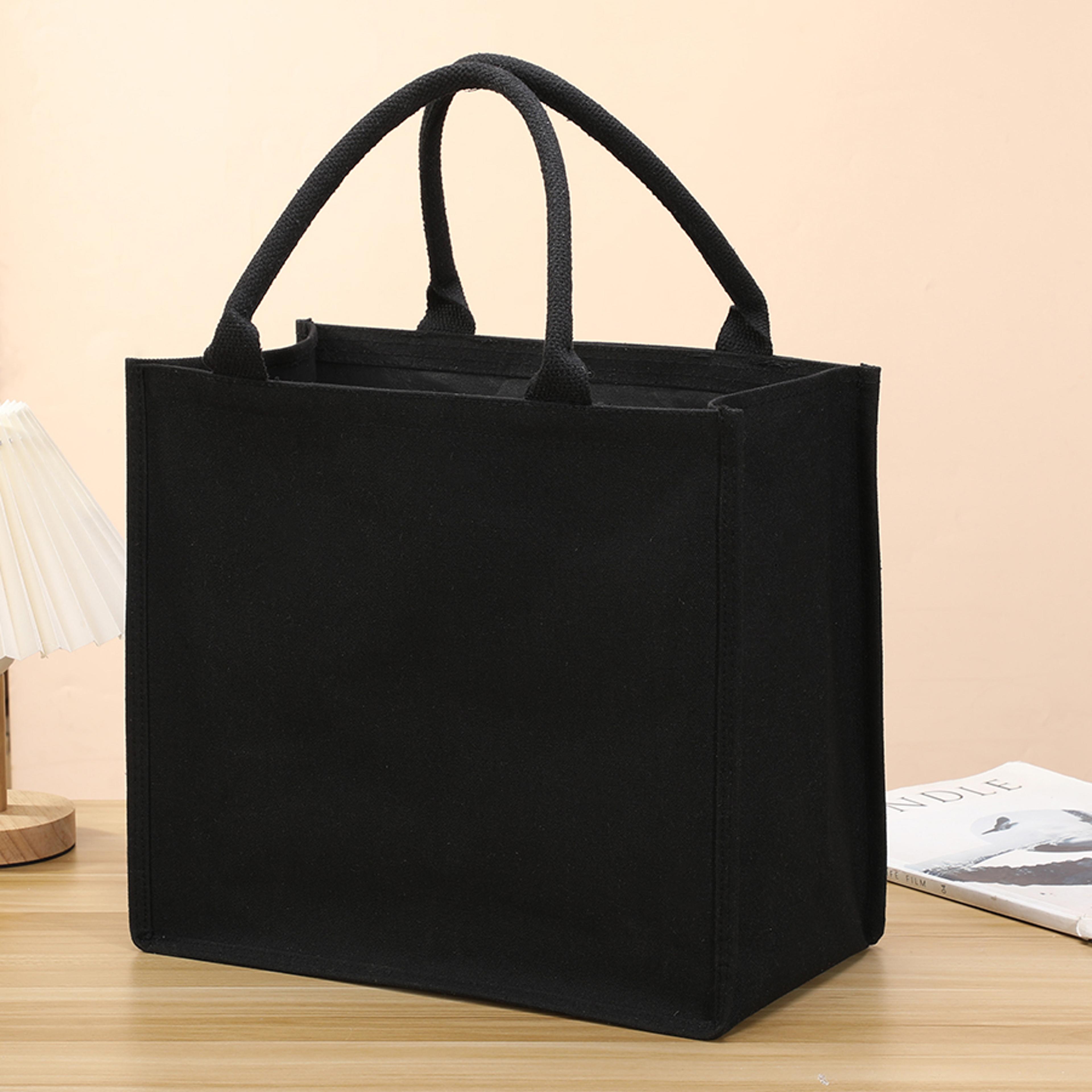 large capacity black canvas tote bag for men and women everyday carry