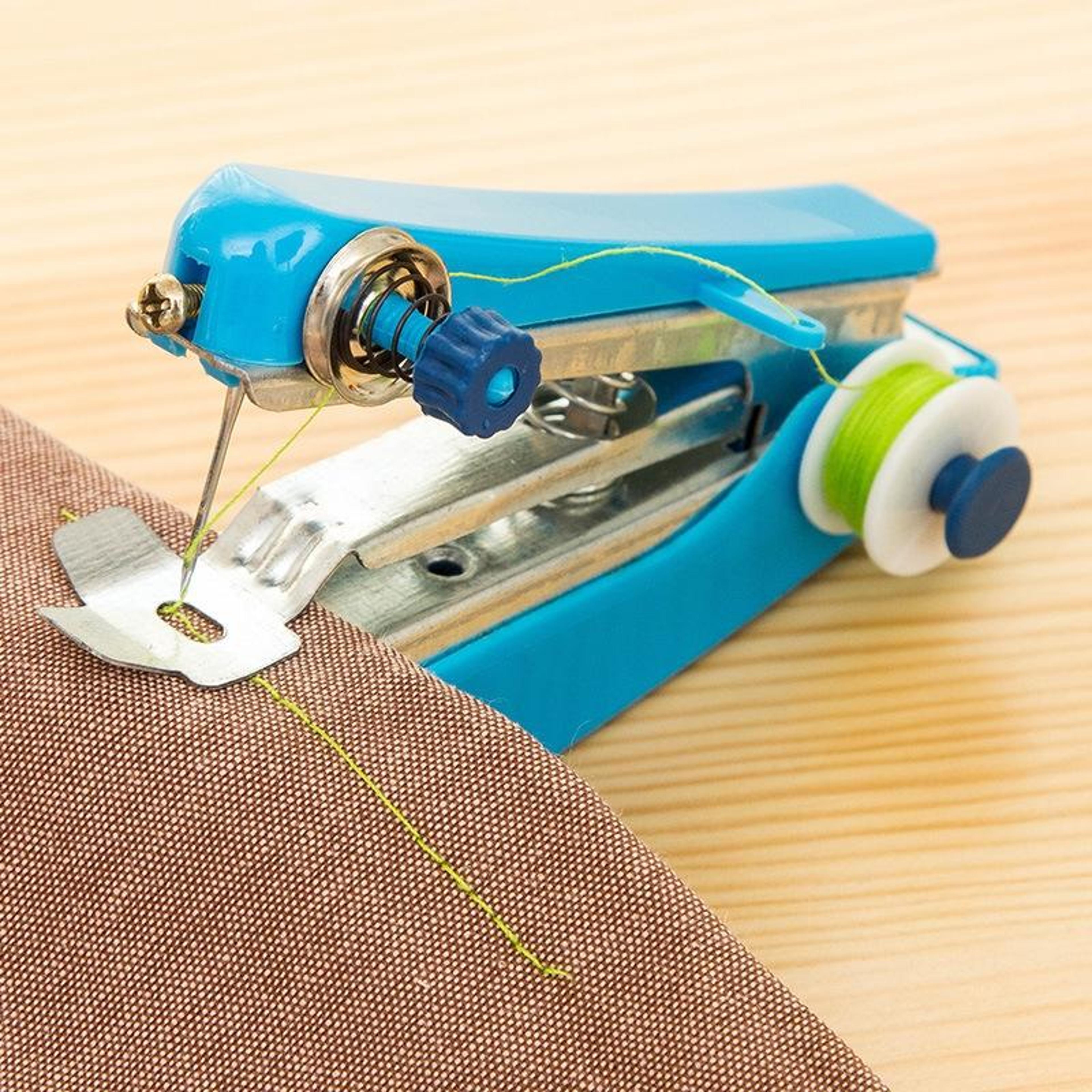 pocketstitch portable handheld sewing machine for quick clothing repairs & travel mending