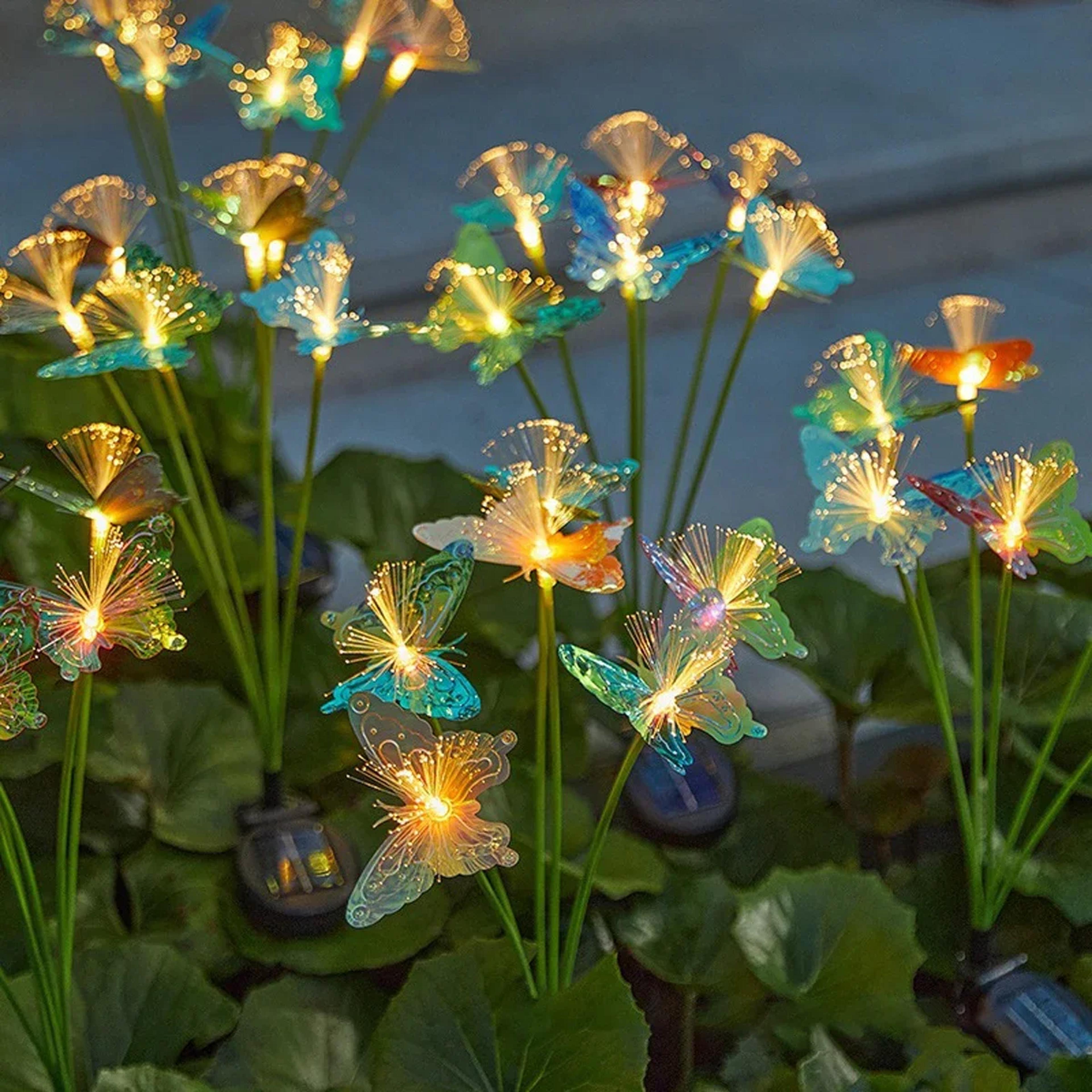 waterproof rechargeable solar-powered butterfly fiber optic light, outdoor garden decor for lawn, yard, and landscape