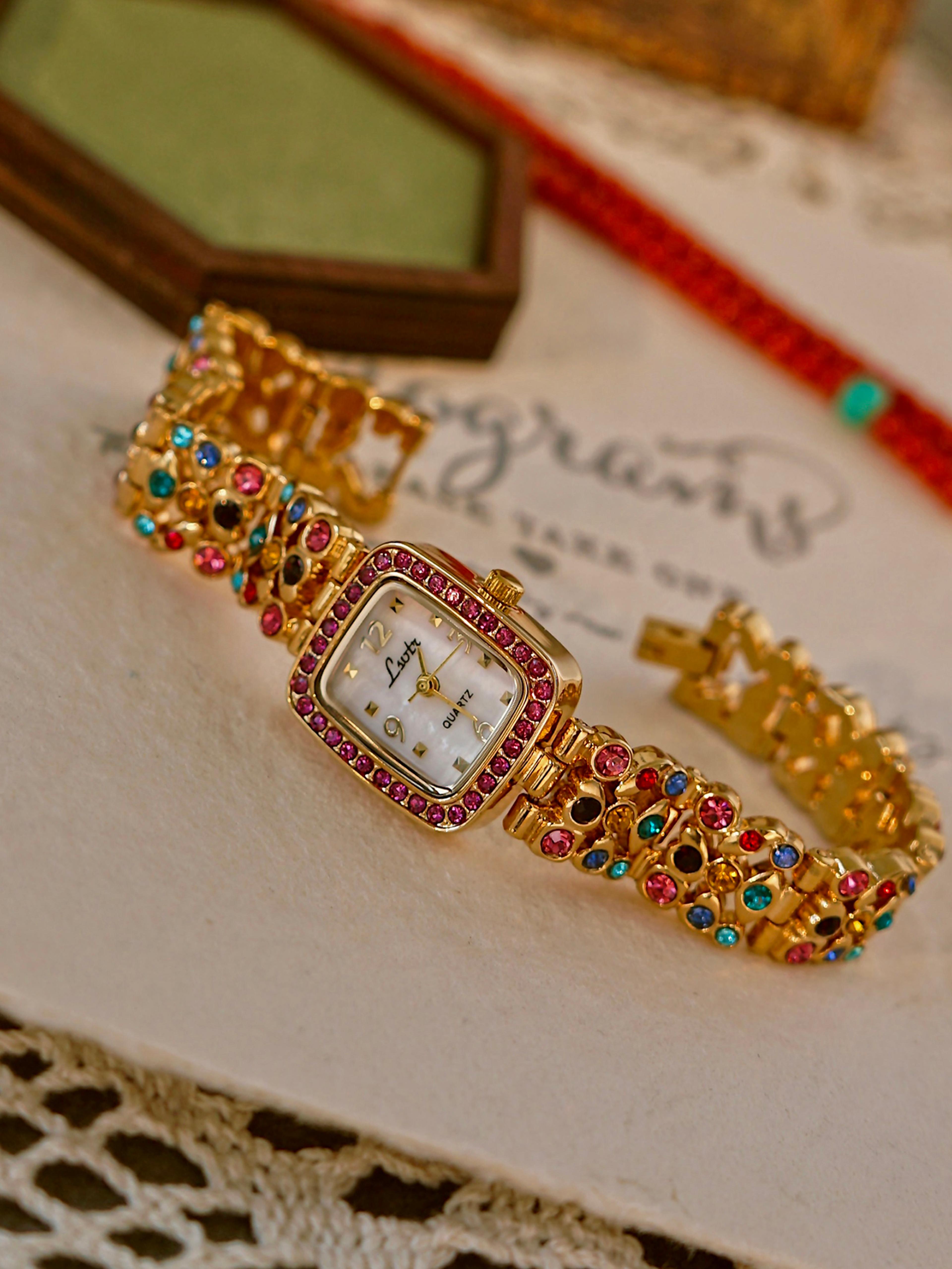 waterproof women's square quartz watch with colorful rhinestone gemstone inlaid strap and mother-of-pearl dial