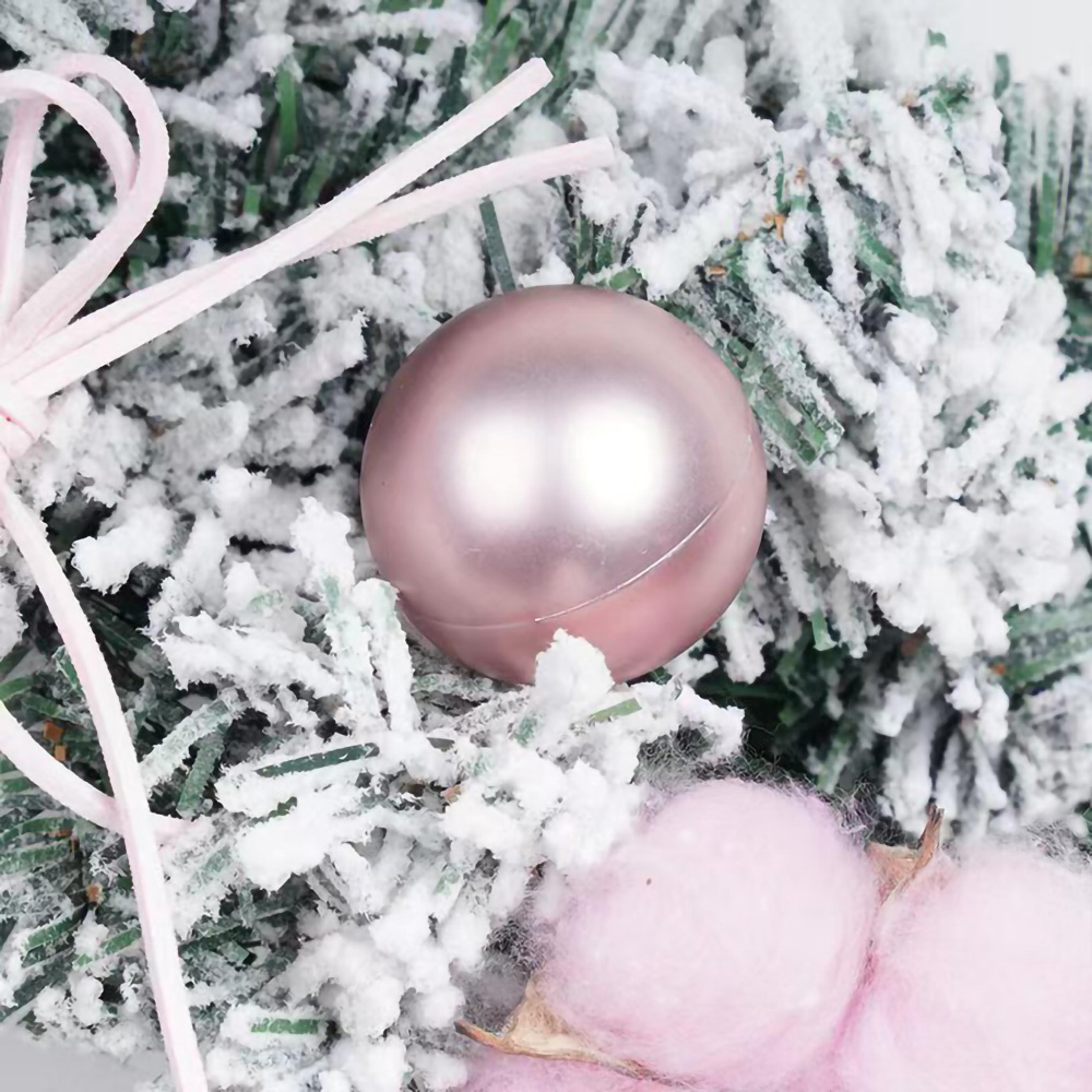 christmas wreaths, pink snowflake decorations, hanging ornaments for christmas atmosphere