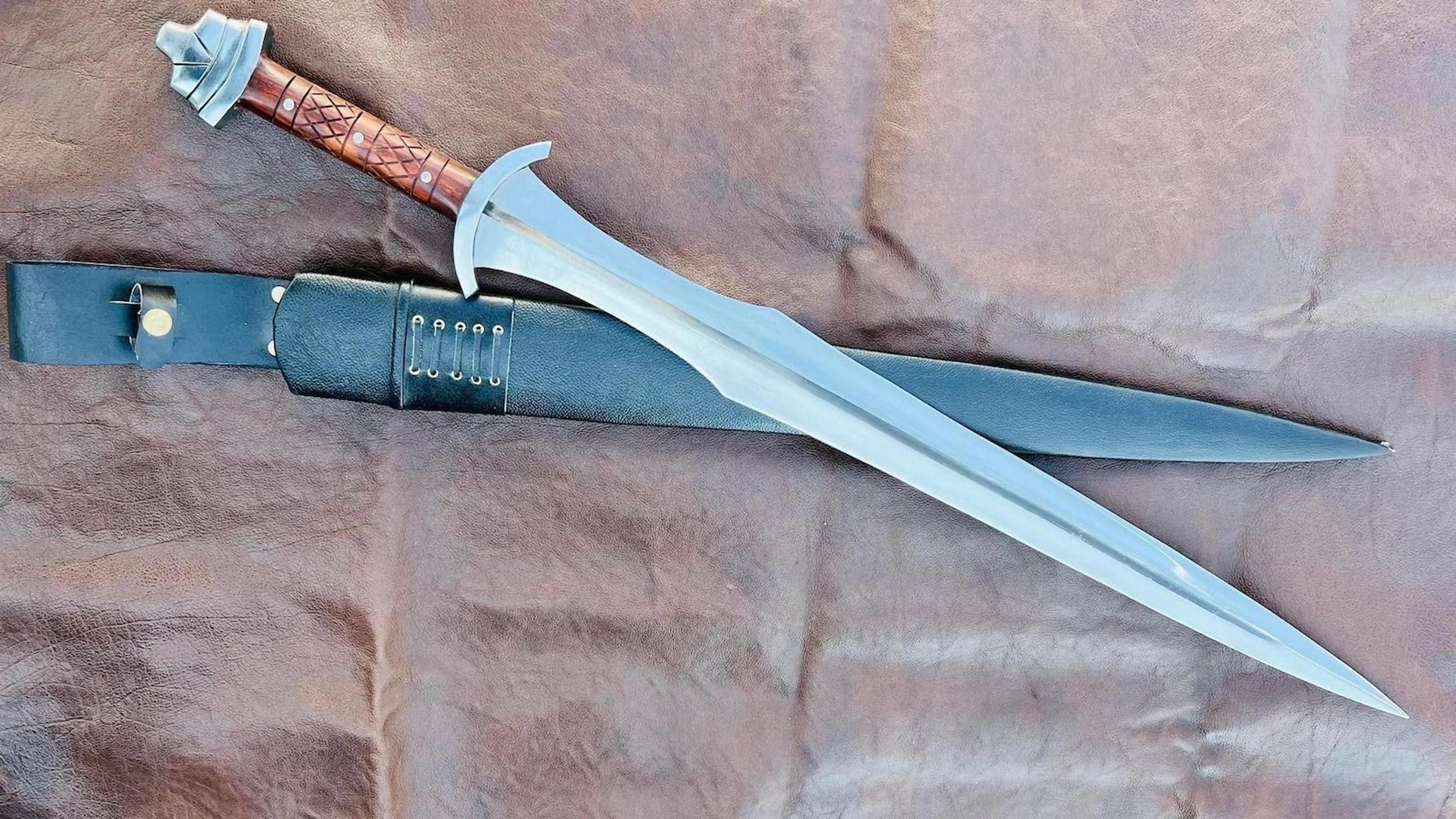 hand forged high carbon steel viking sword with full tang, carved wood handle & leather scabbard