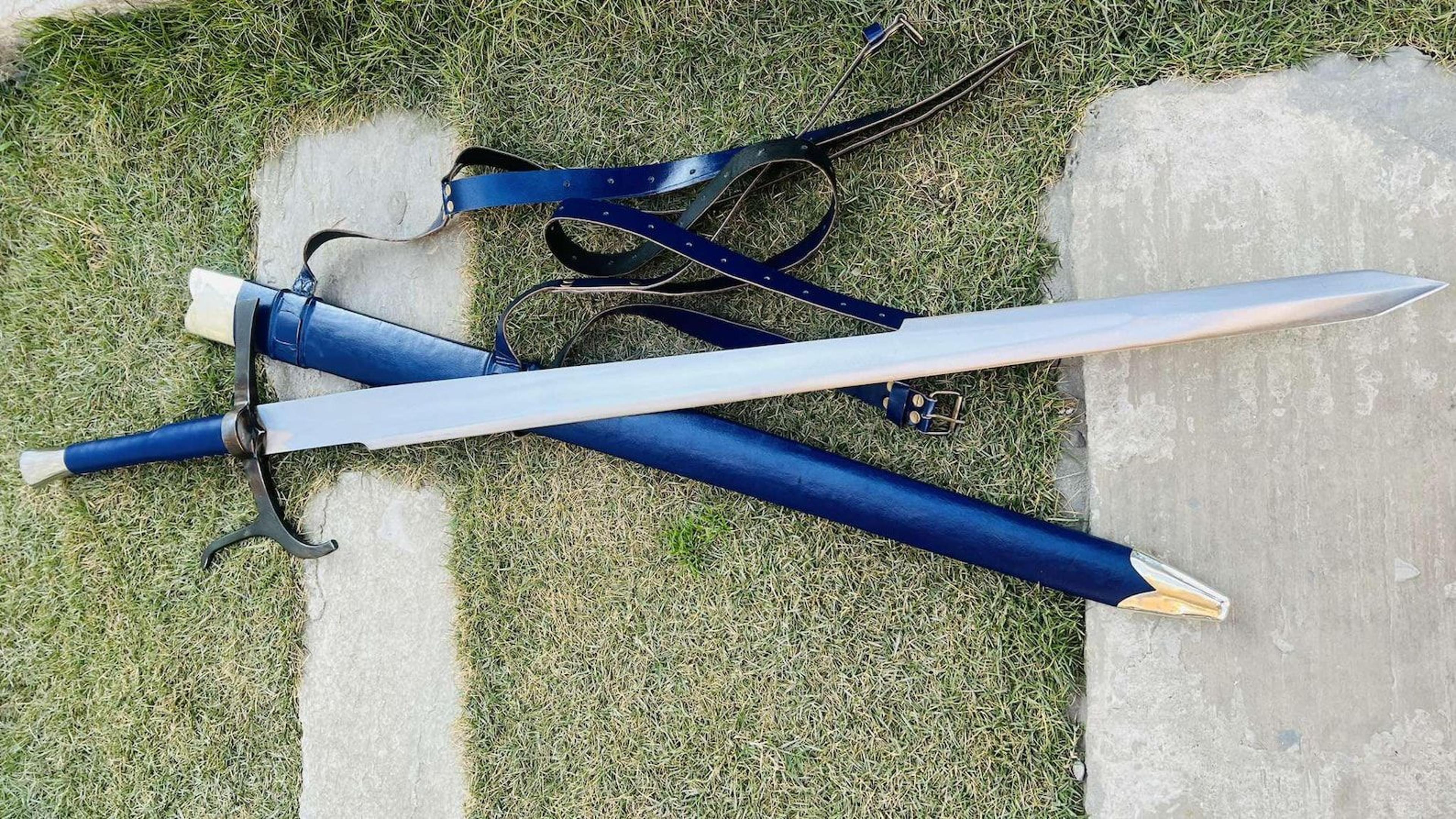 hand forged high carbon steel medieval long sword with blue leather scabbard, sword belt & full tang construction