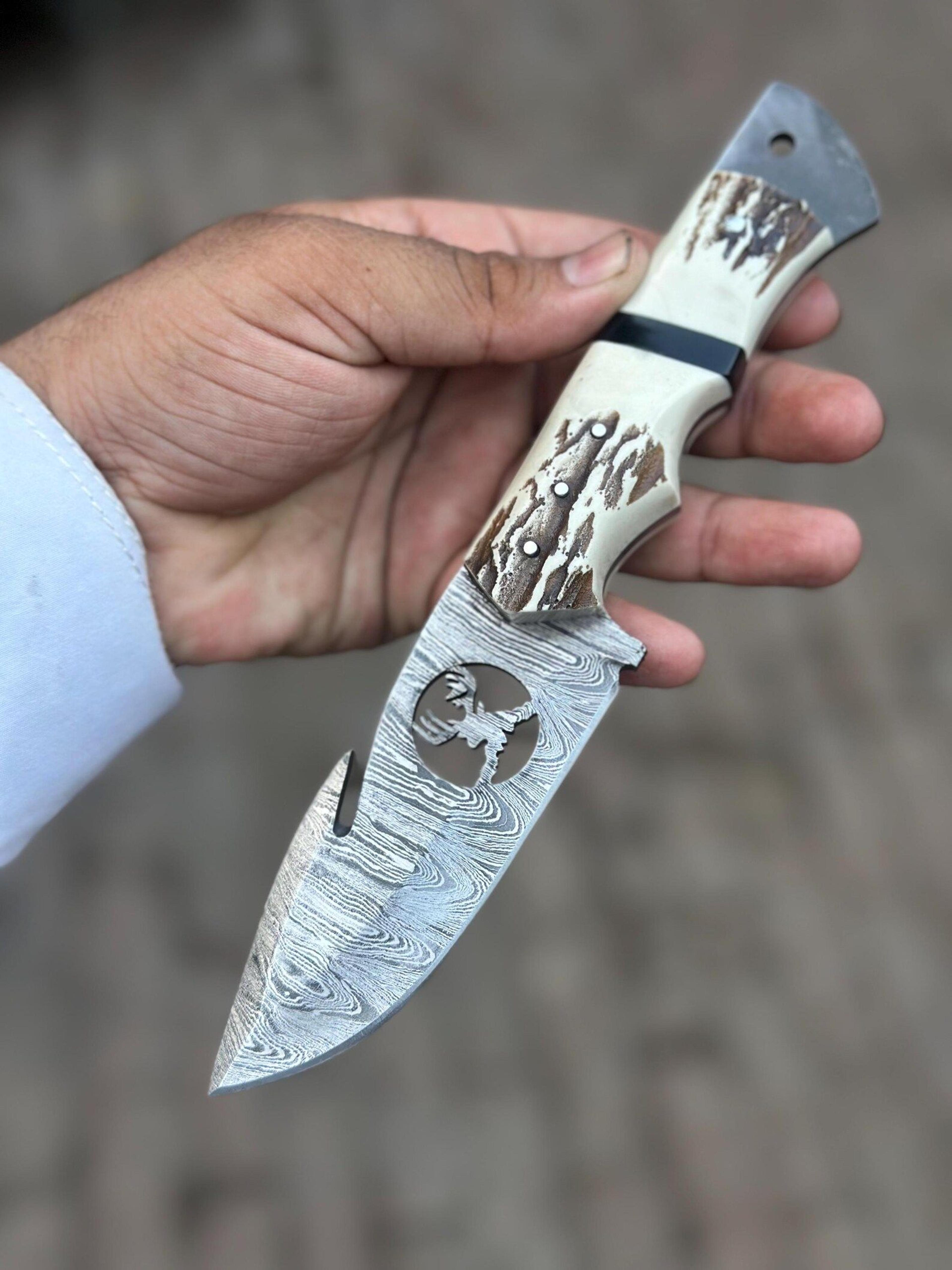 handmade damascus hunter knife with genuine stag handle – artisan fixed blade for collectors & outdoor excellence descri