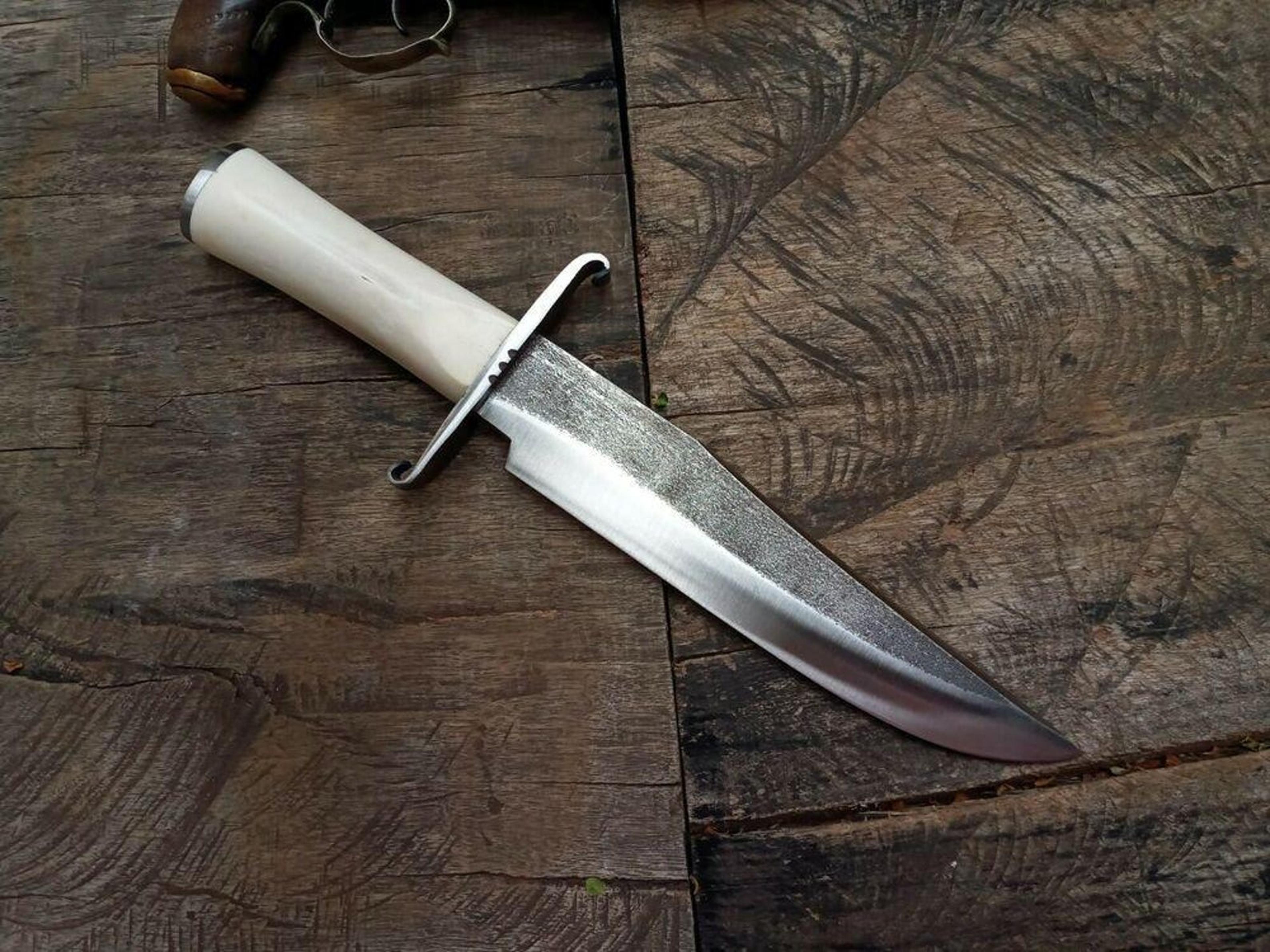 hand forged j2 steel bowie knife with white resin handle and leather sheath - perfect for outdoor adventures