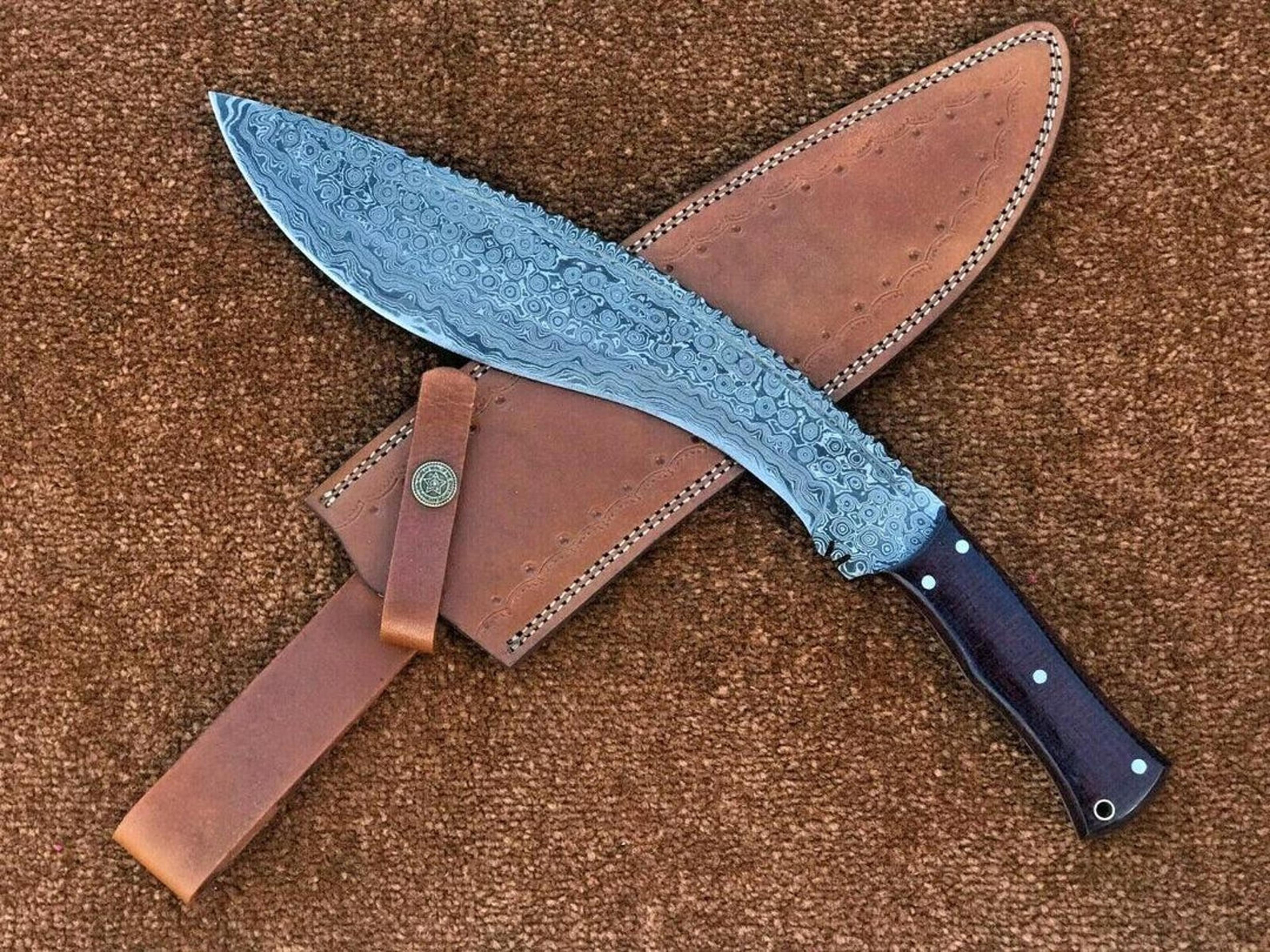 premium damascus steel fixed blade kukri knife with raindrop pattern and leather sheath for tactical and outdoor use