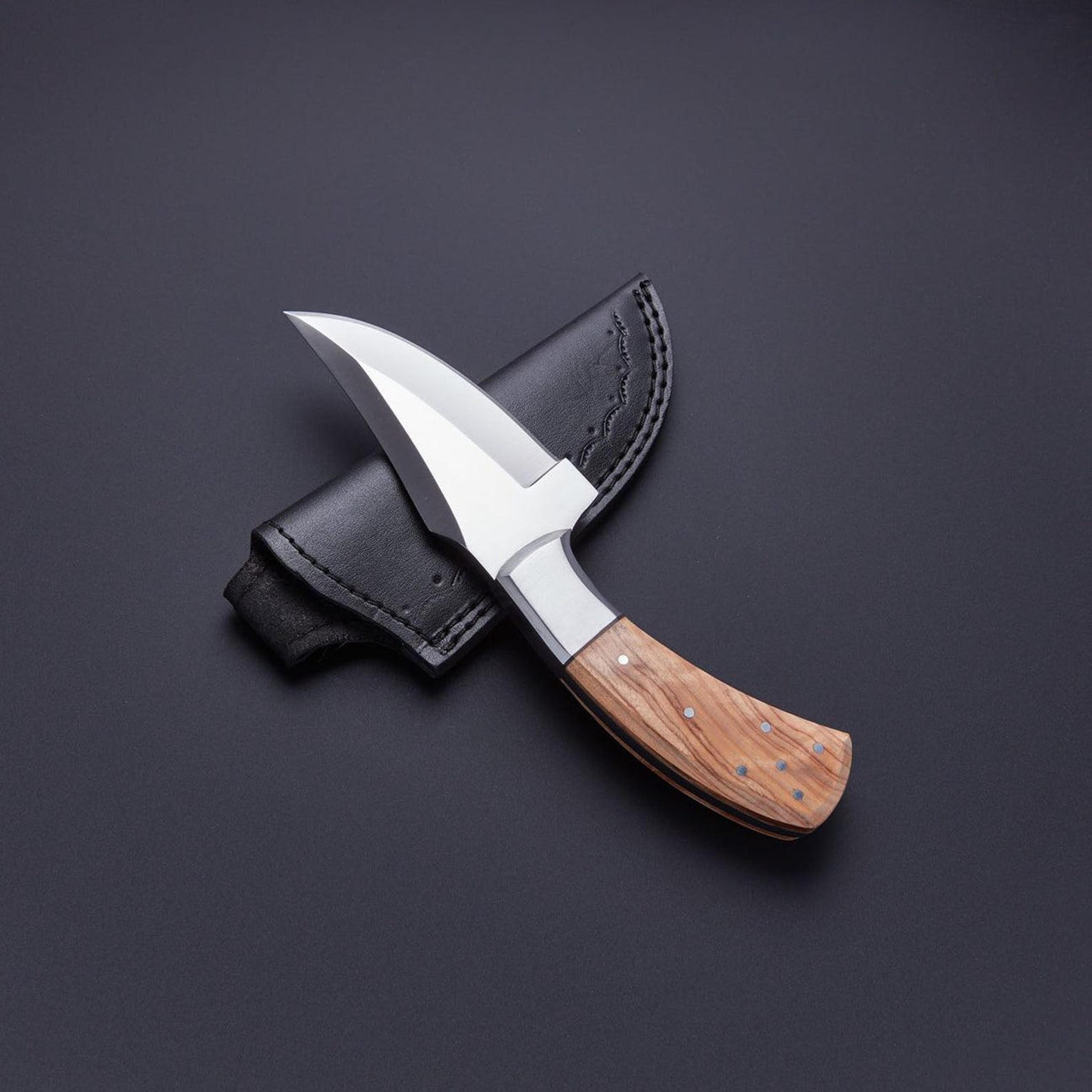 premium handmade d2 steel hunting knife with olive wood handle and black leather sheath