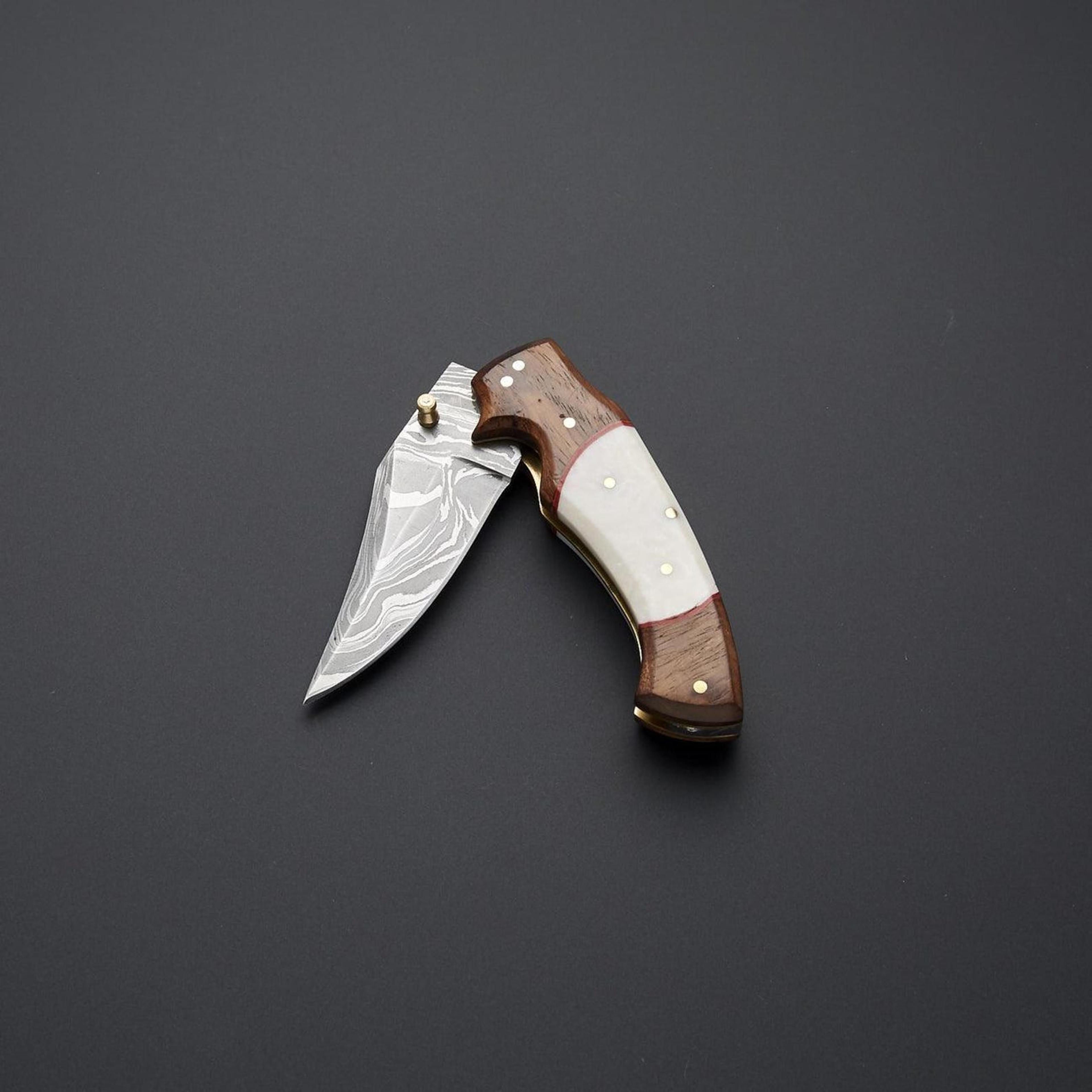handmade damascus steel folding knife with rose wood and bone handle, leather sheath,